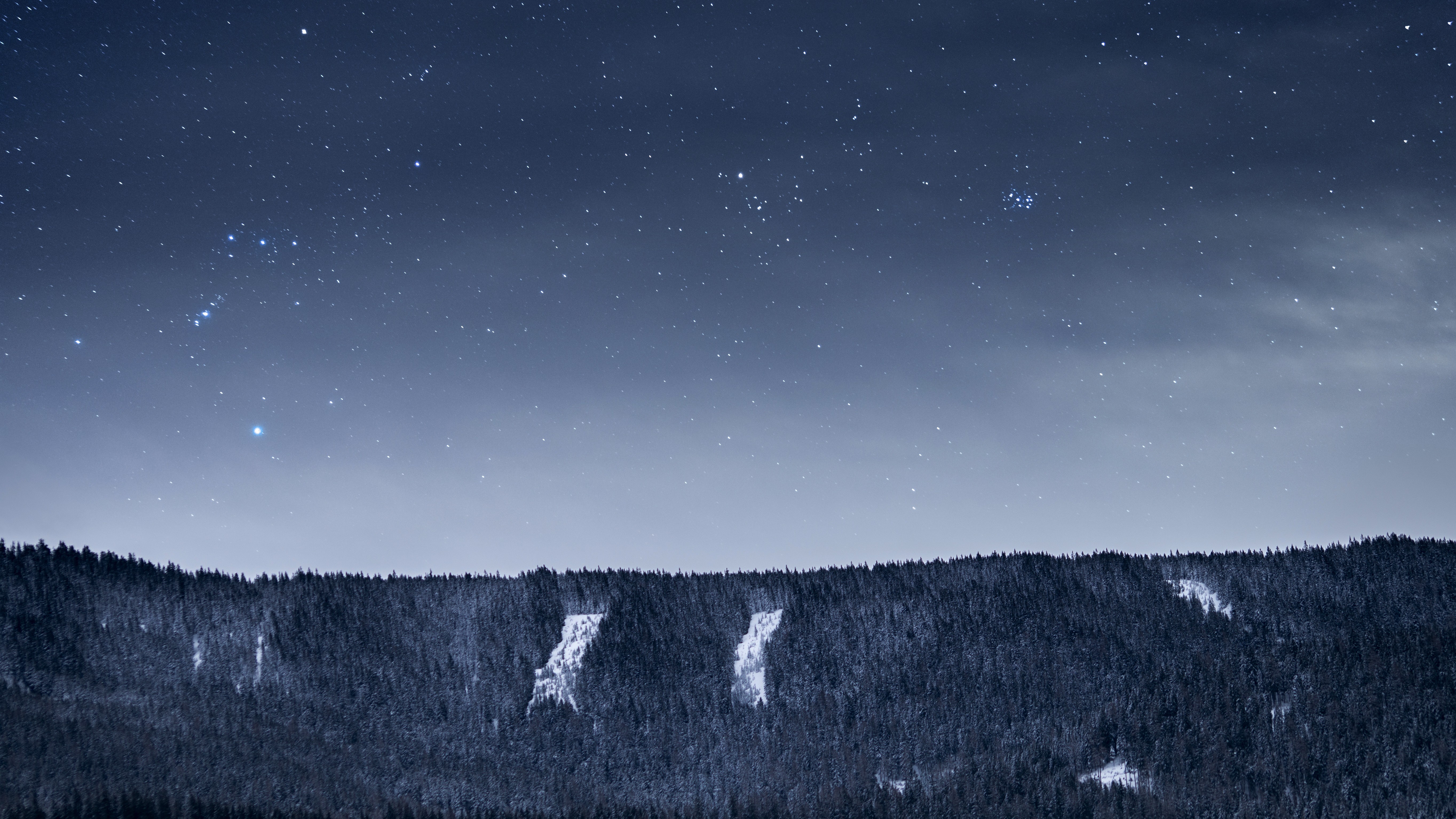 Starry Night Sky Over Snow-Covered Mountains HD Wallpaper