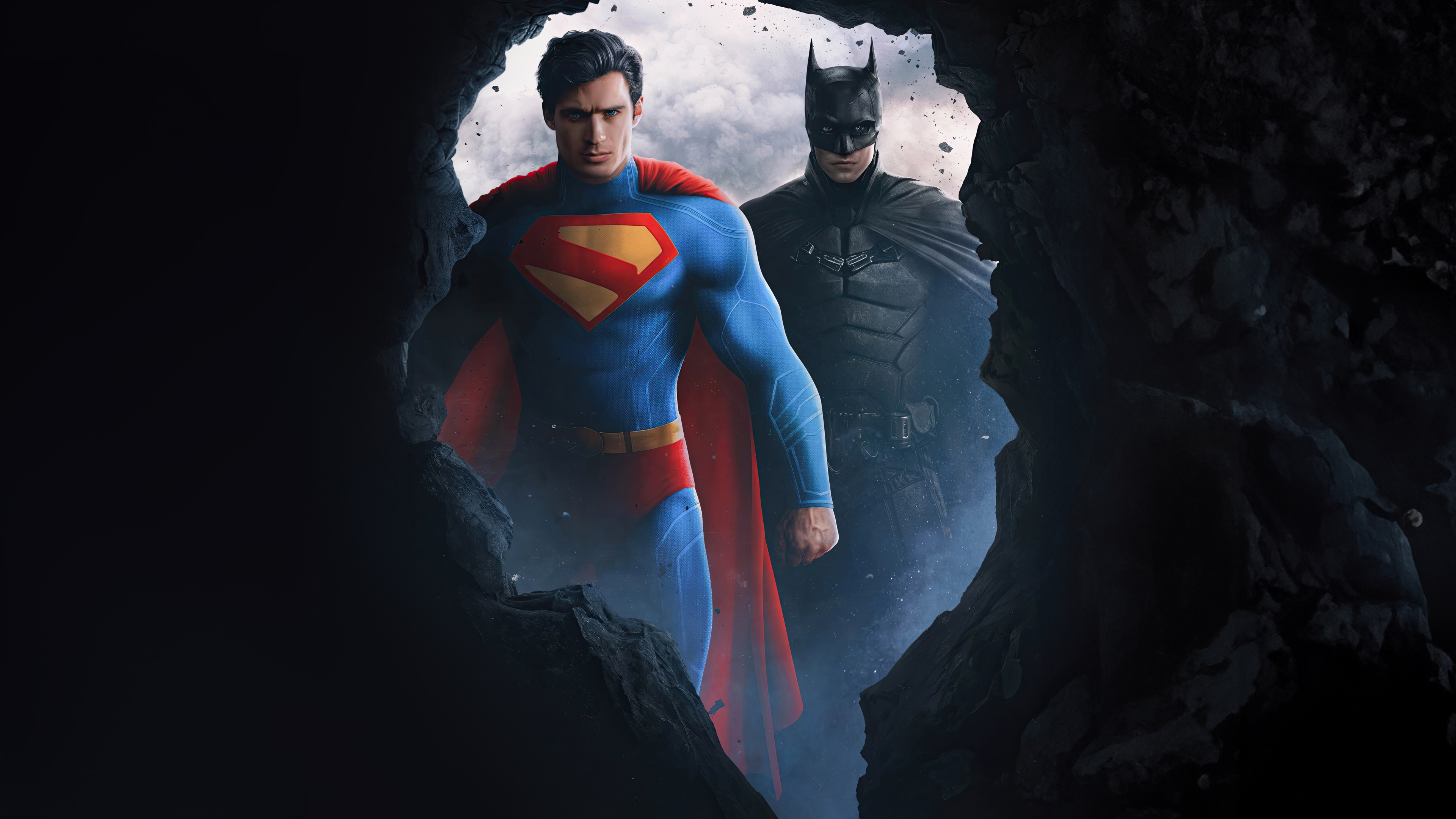 Superman and Batman emerge from a cave HD Wallpaper