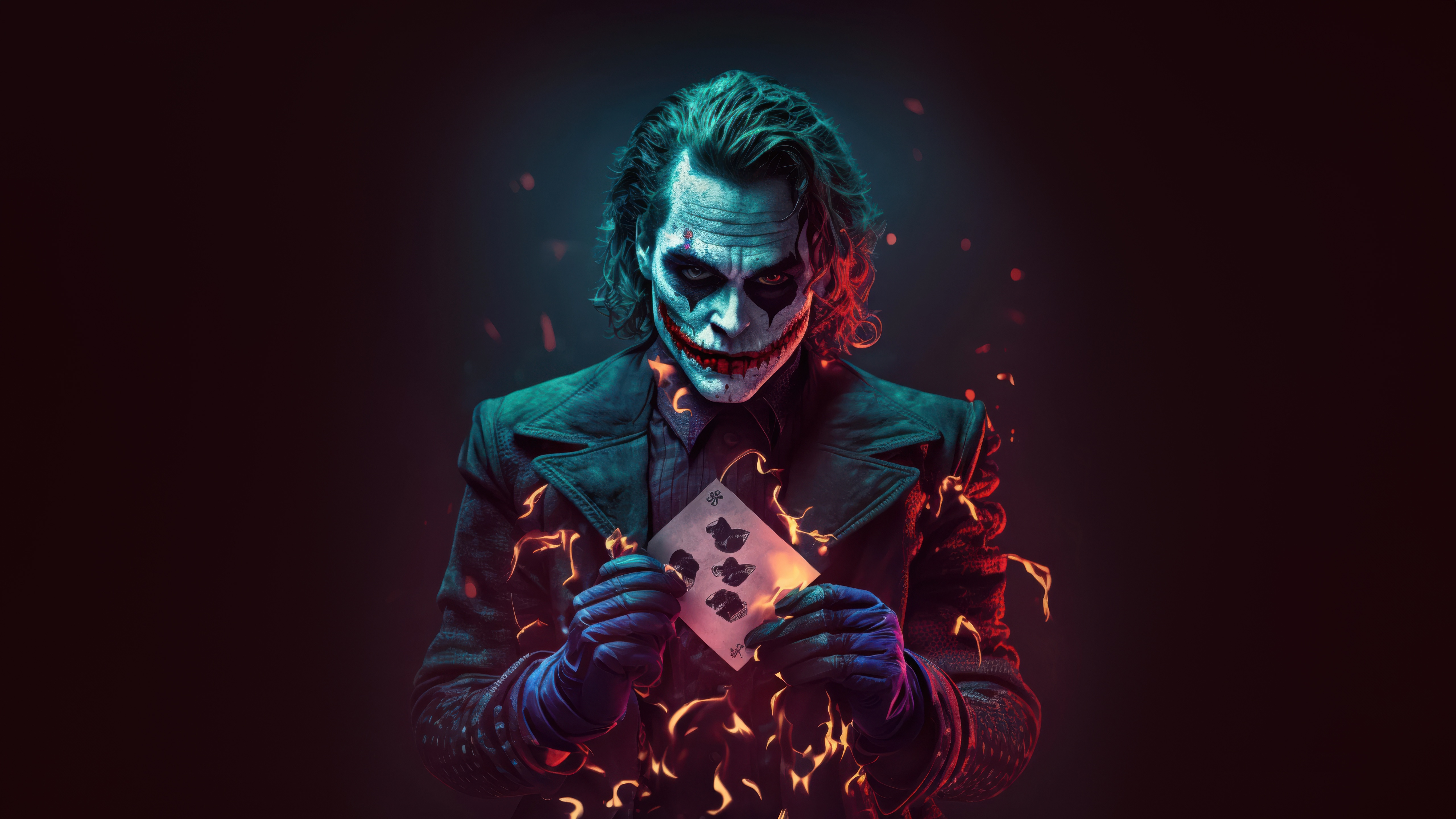 The Joker holding a playing card with flames HD Wallpaper