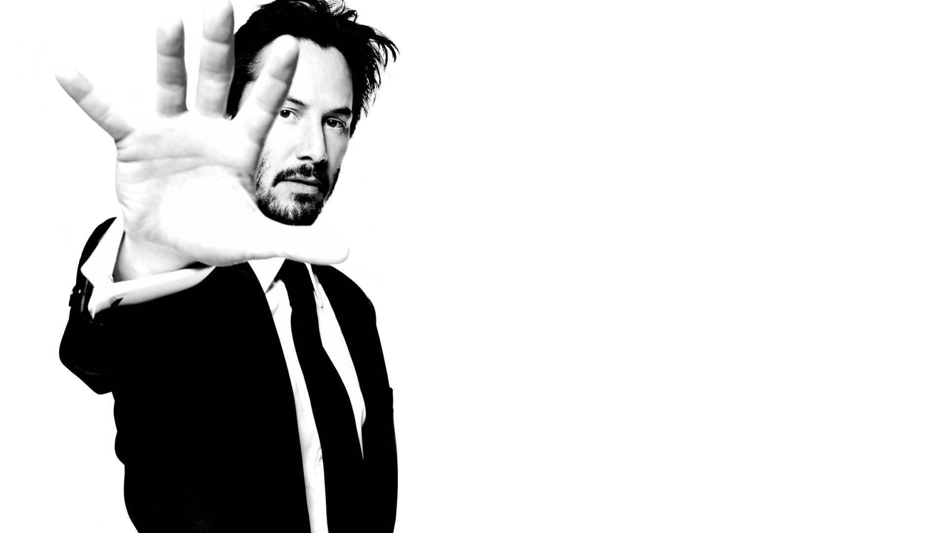 Keanu Reeves in a suit HD Wallpaper