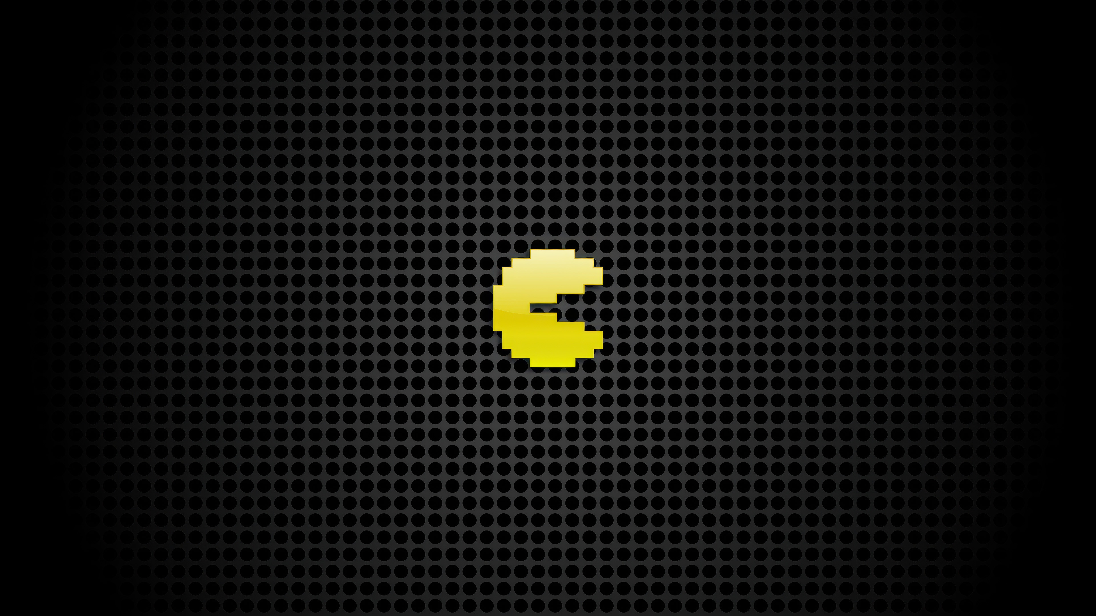 Pac-Man on a dark perforated background HD Wallpaper
