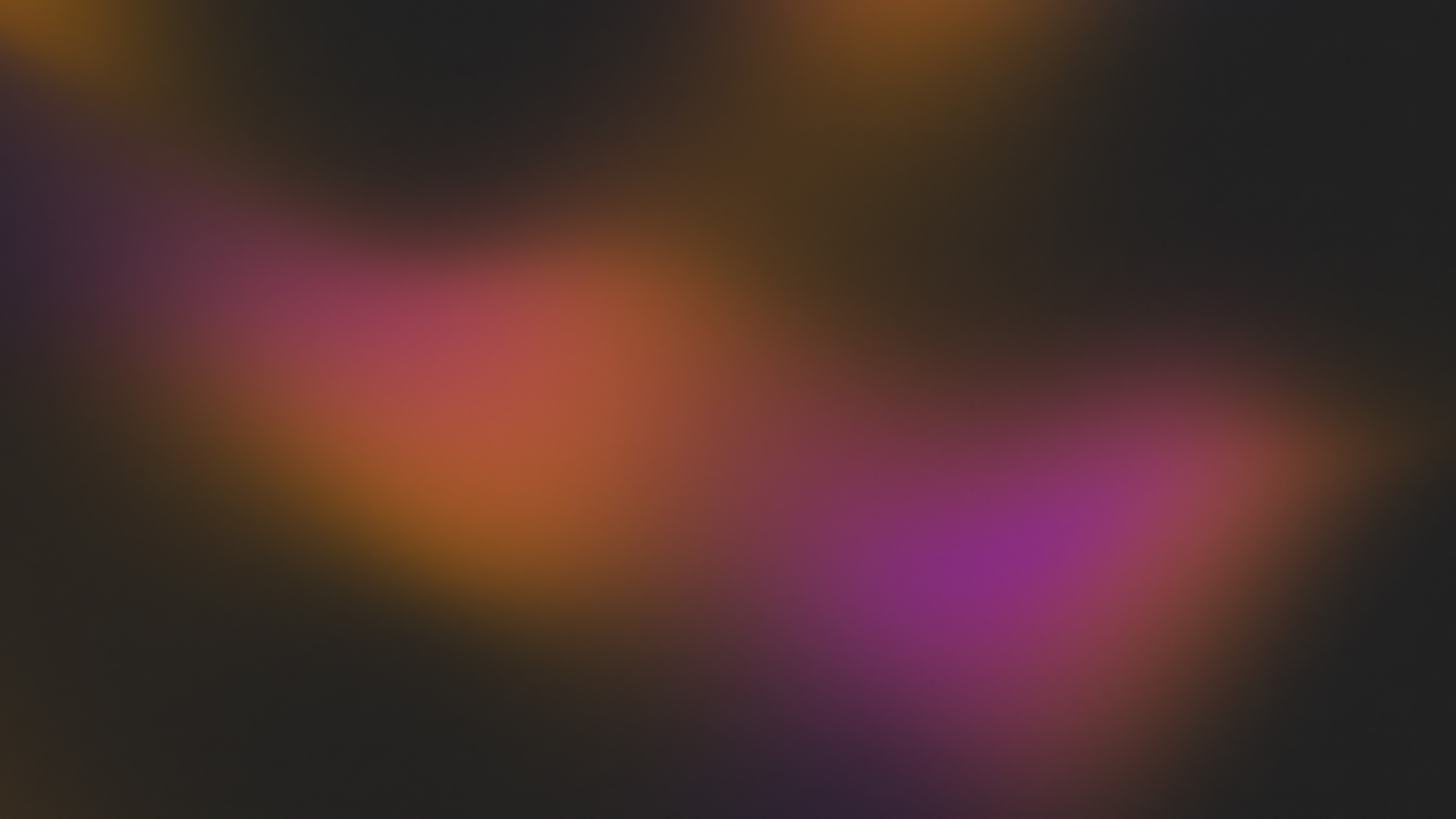 Abstract gradient blur with orange and purple hues HD Wallpaper