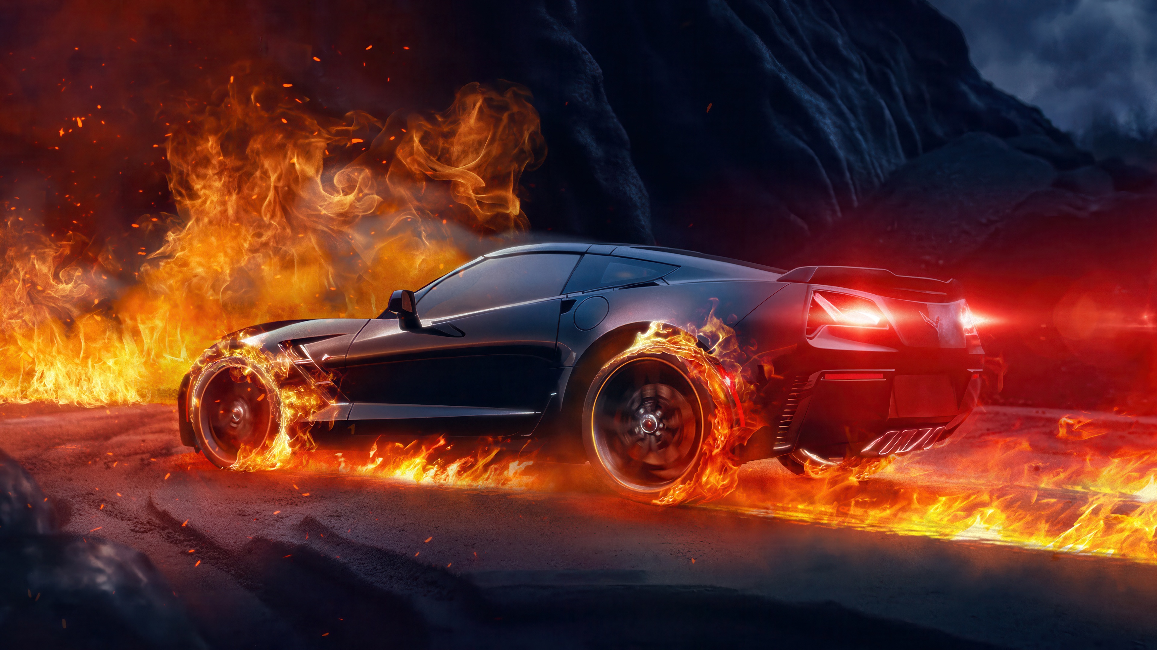 Black Chevy Corvette on fire on a dirt road HD Wallpaper