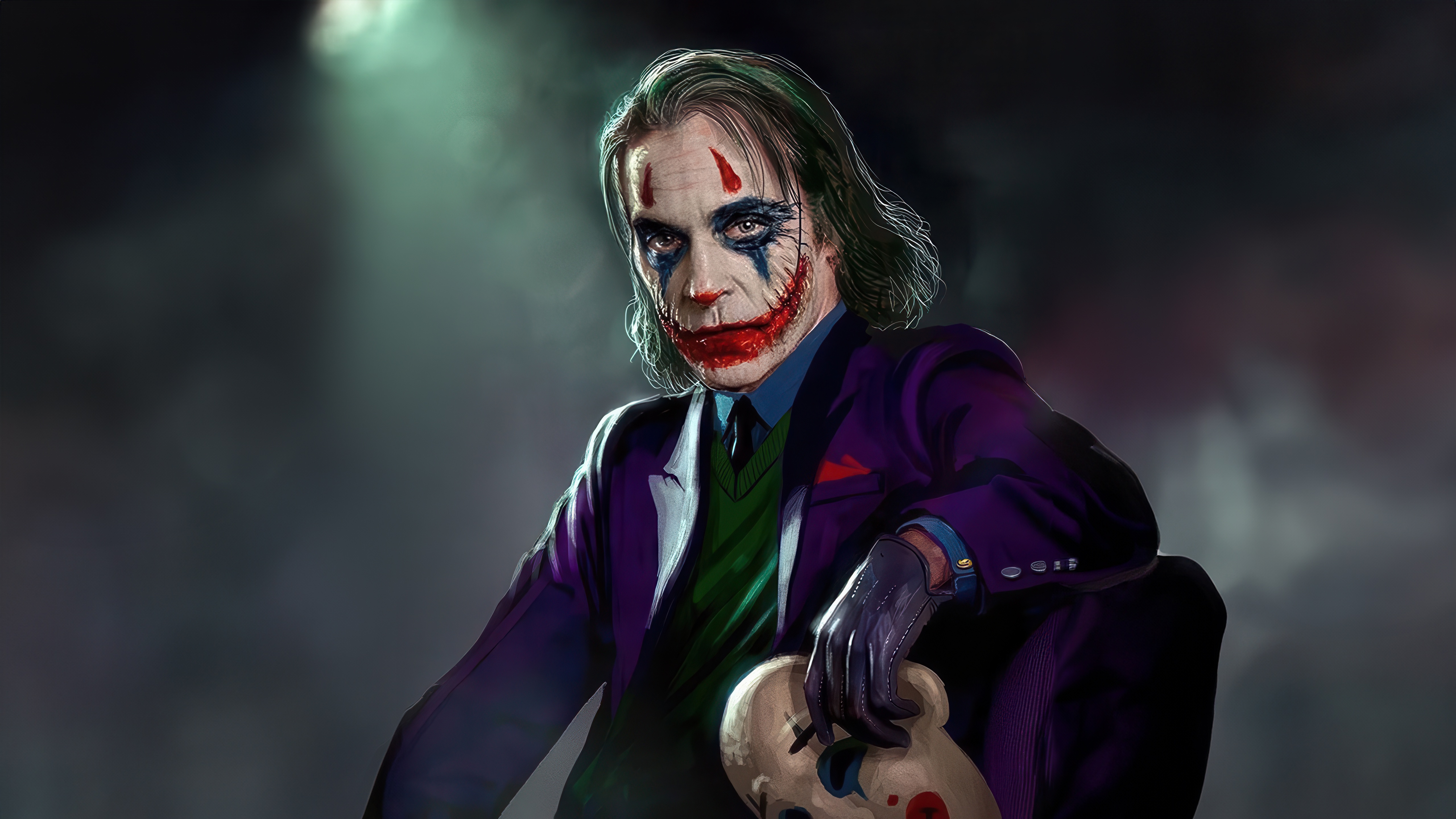 The Joker holding a mask HD Wallpaper