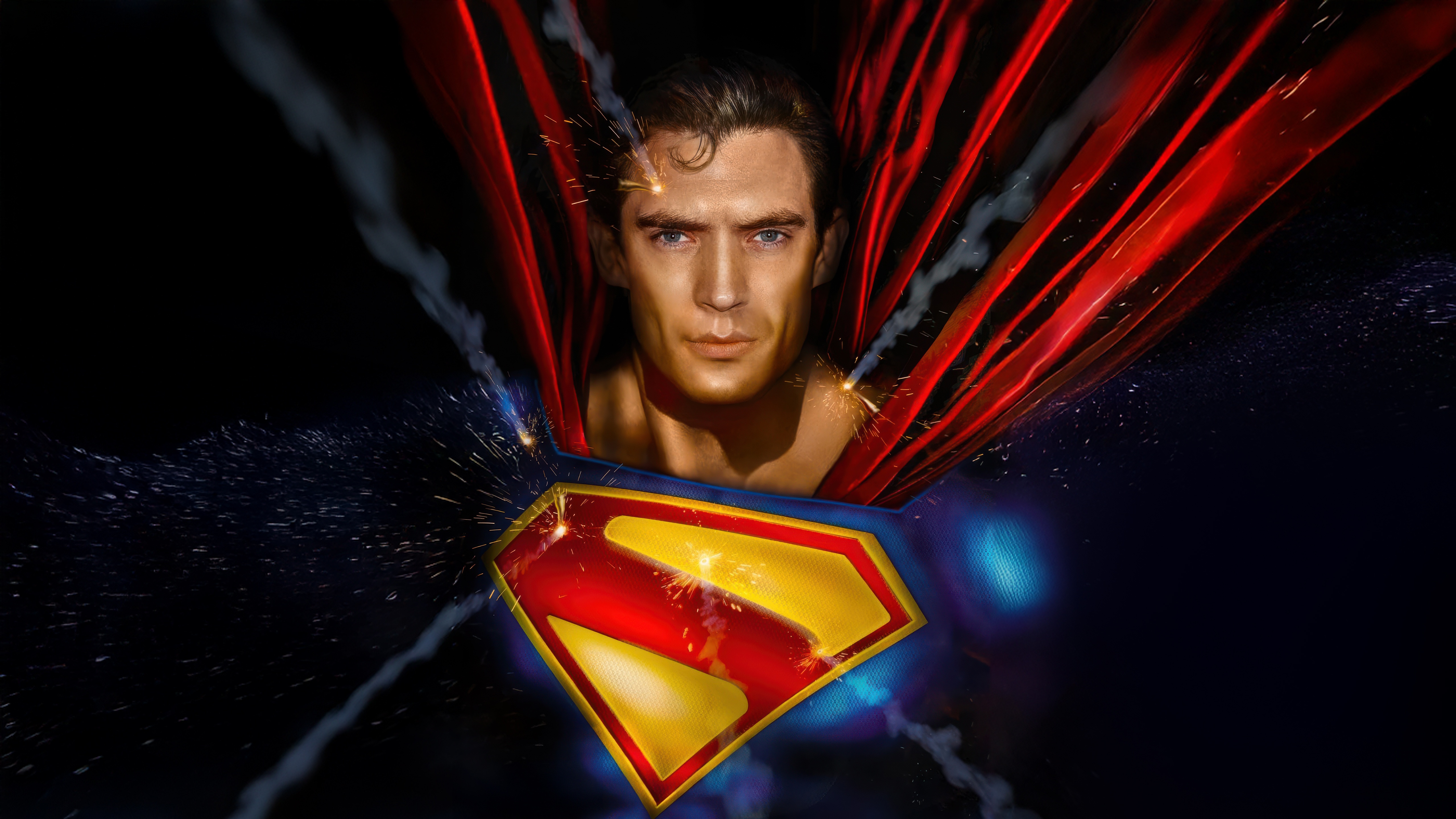 Superman with his iconic S-shield and red cape HD Wallpaper