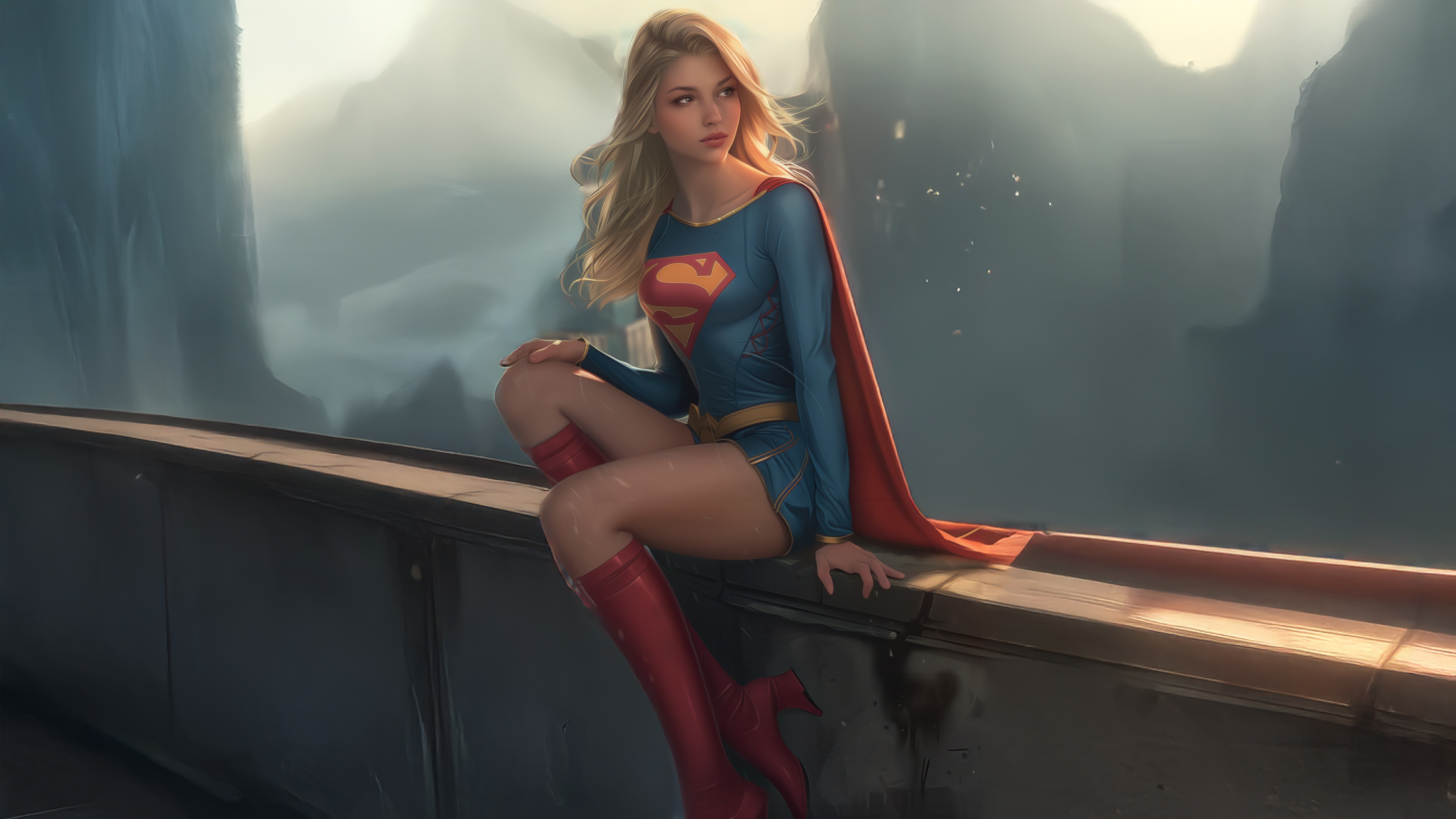 Supergirl sitting on a ledge overlooking a misty landscape HD Wallpaper