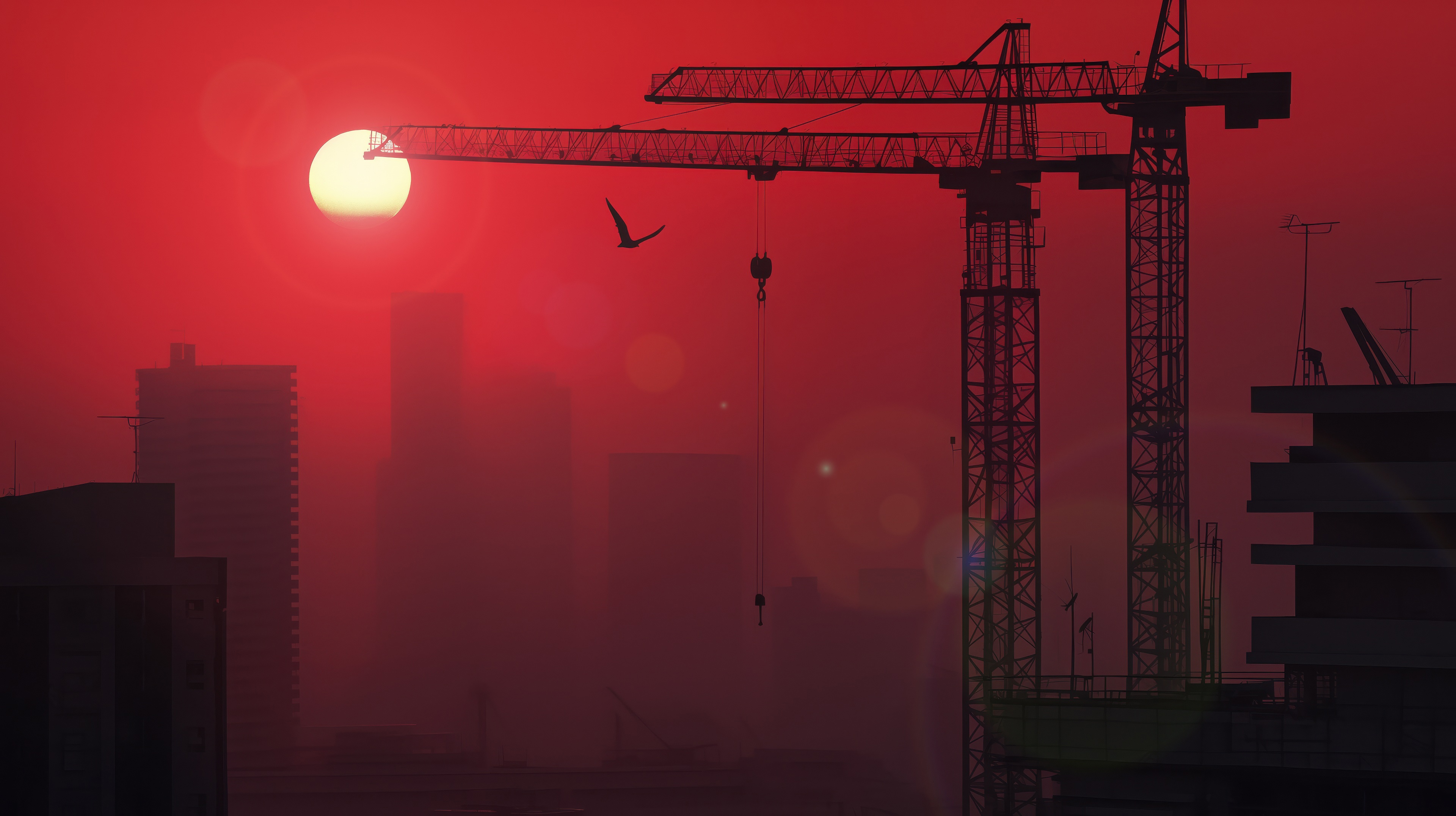Cityscape with cranes at sunset HD Wallpaper