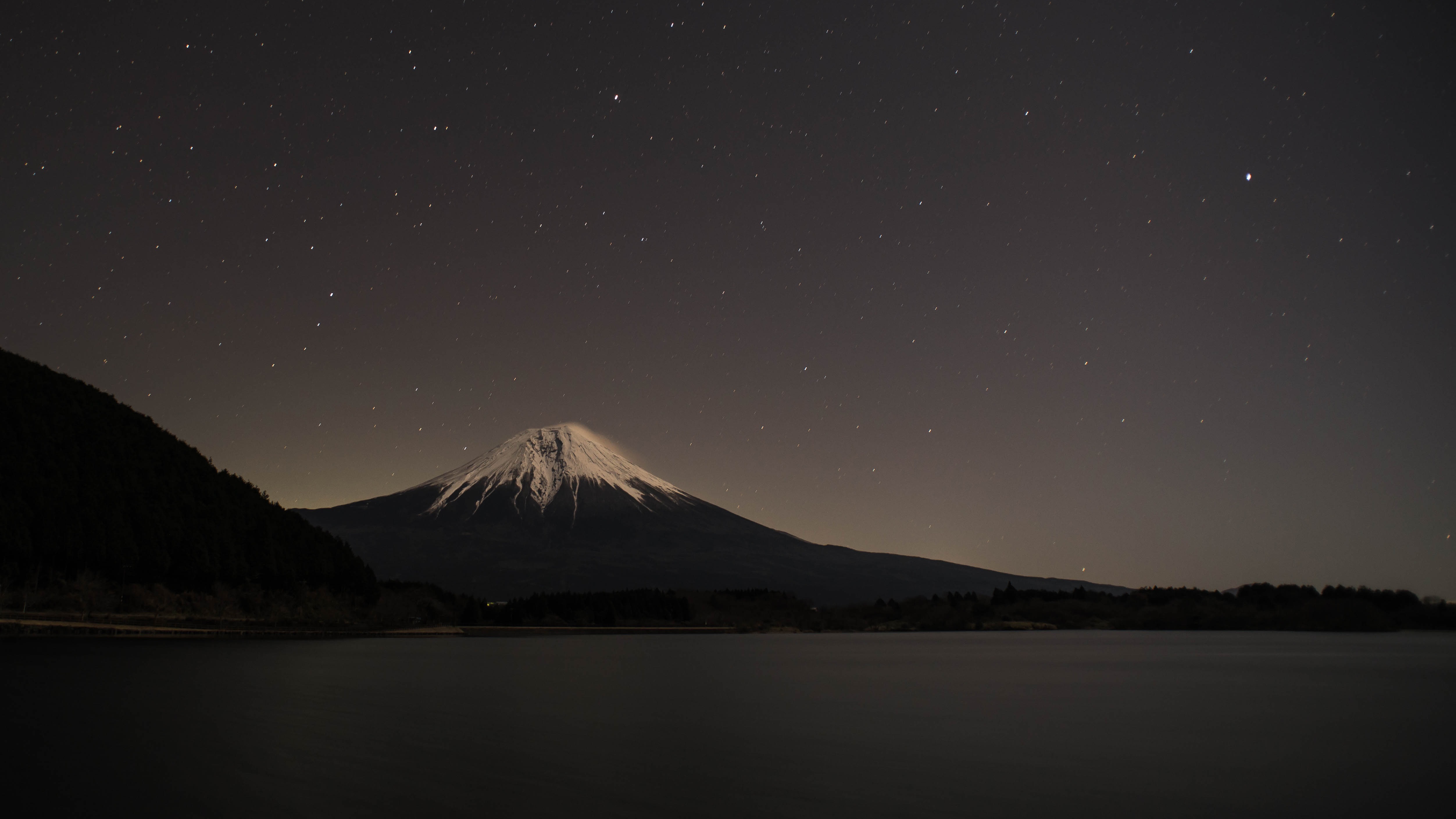 Mount Fuji at night over a lake with stars HD Wallpaper