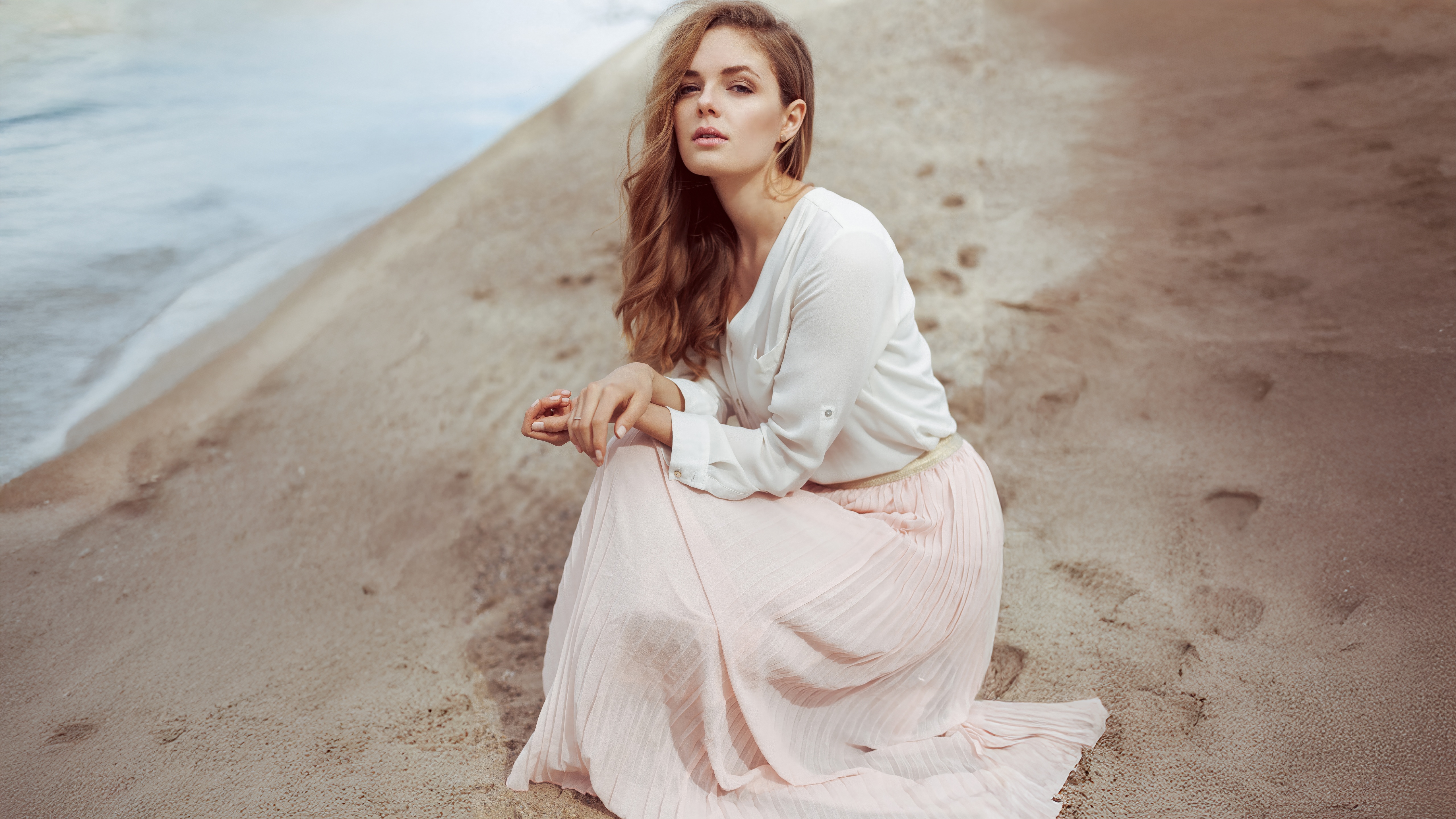 Woman in a white shirt and pink skirt on a sand dune HD Wallpaper