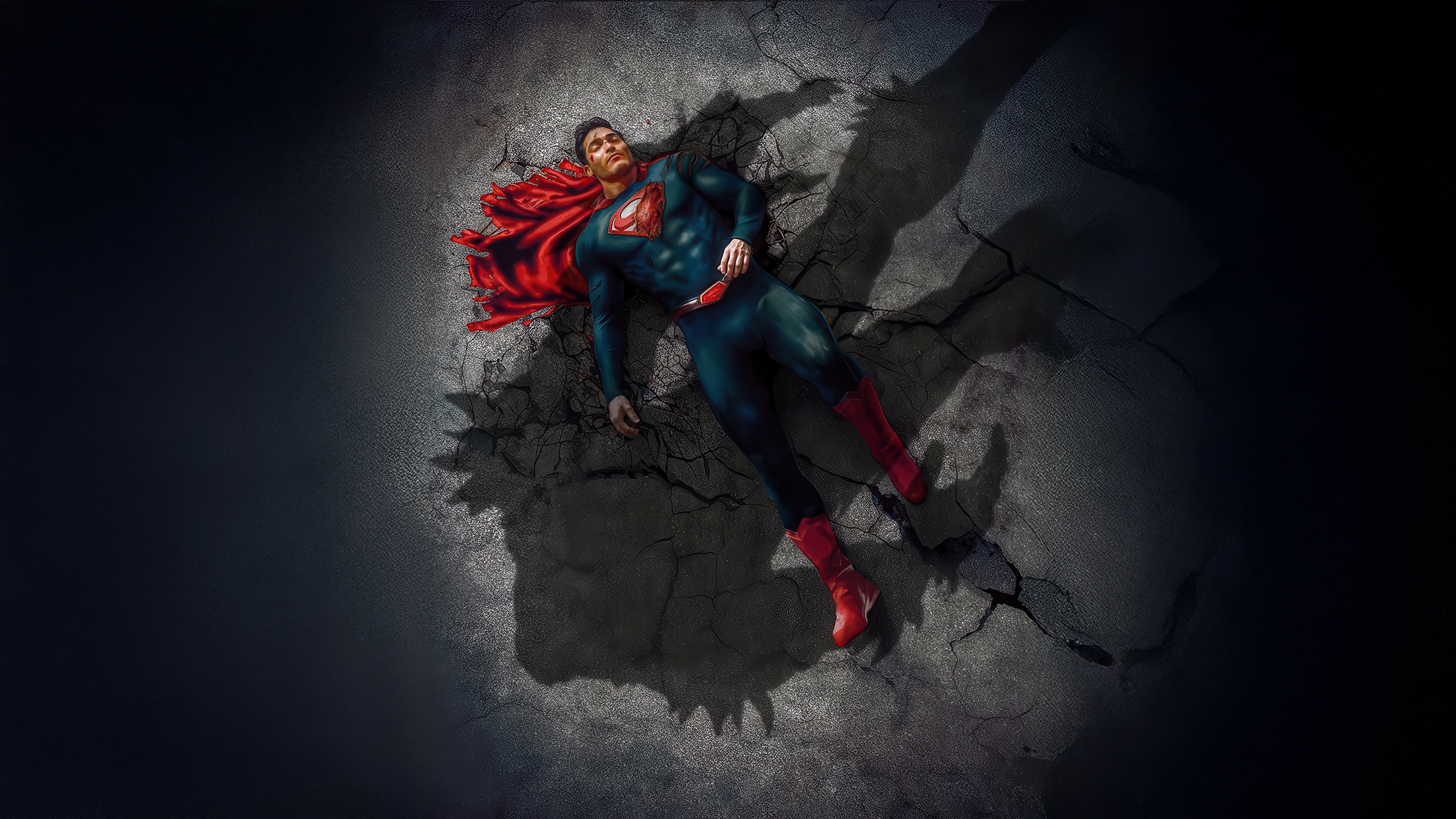 Superman lying on cracked ground HD Wallpaper