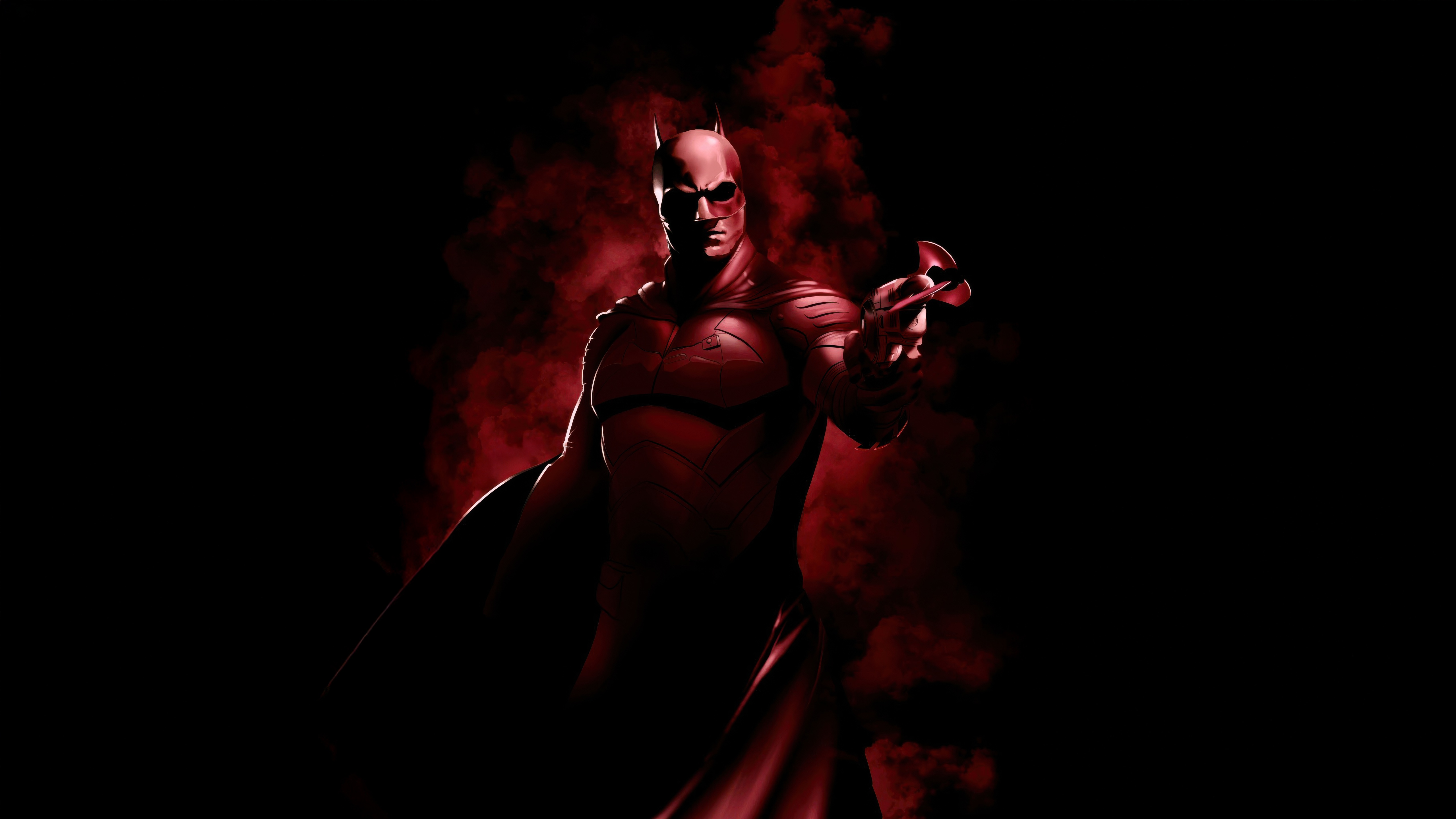 The Batman holding a Batarang HD Wallpaper