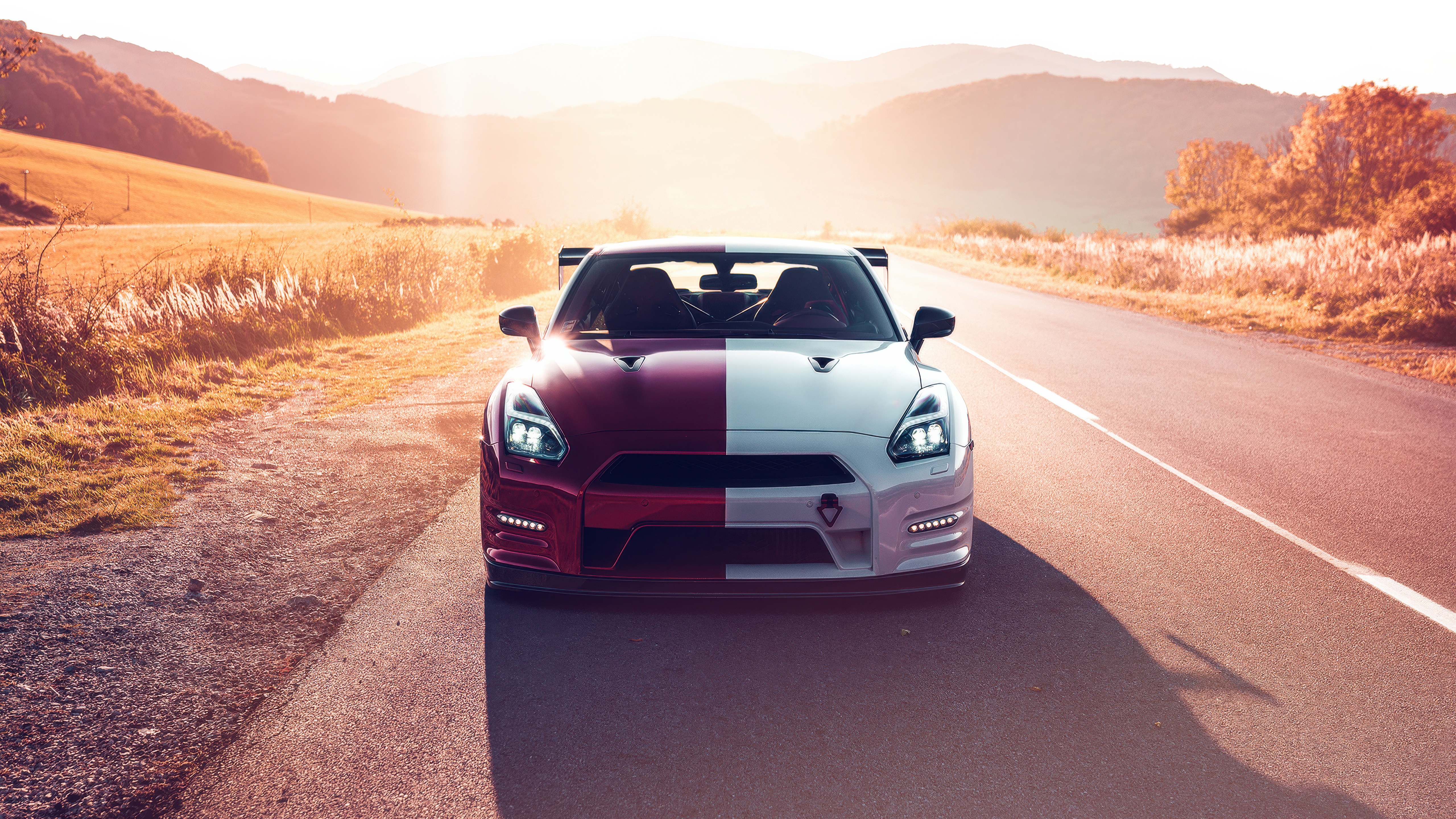 Red and White Nissan GTR on a Road HD Wallpaper