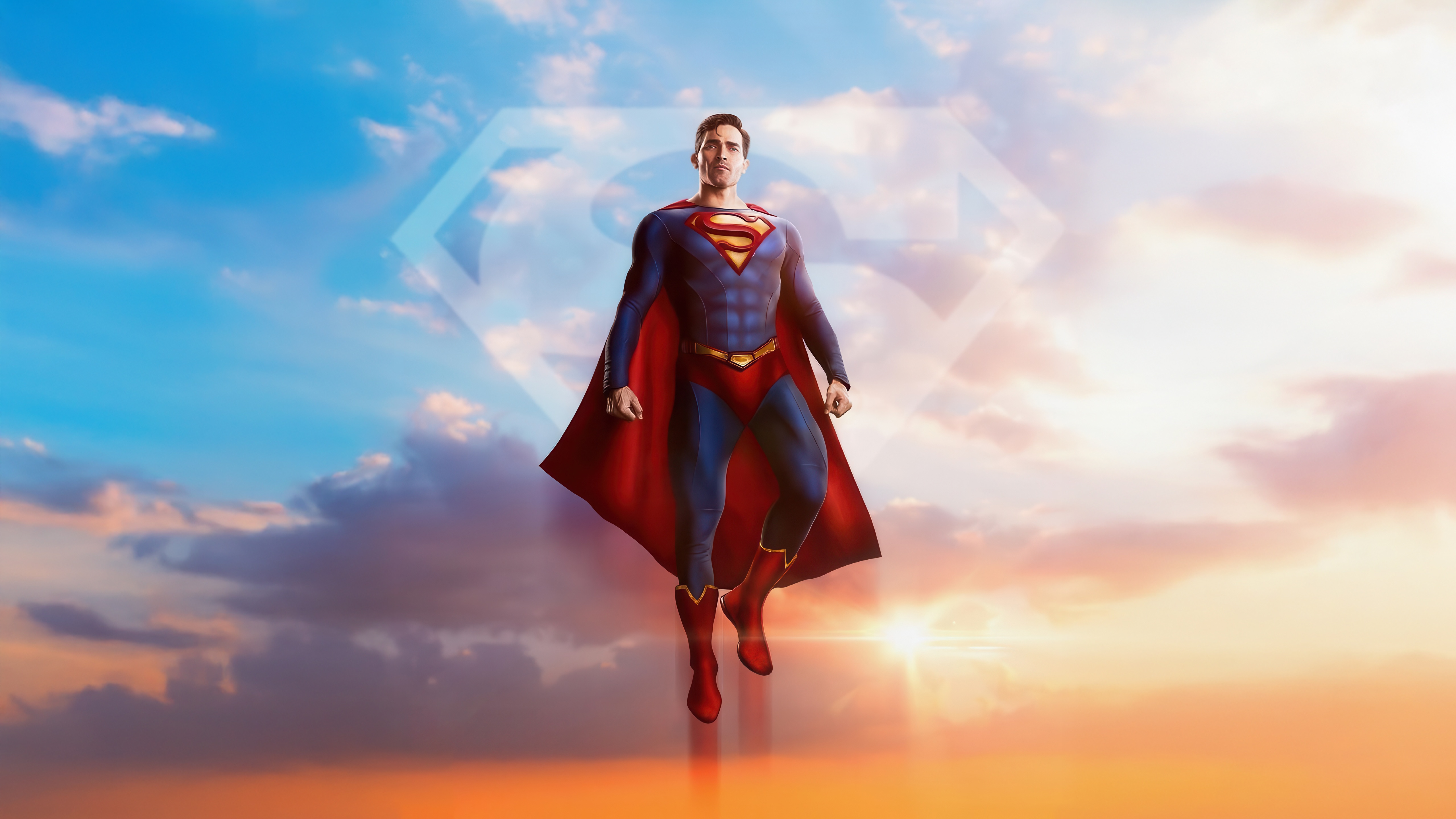 Superman flying in the sky with a logo HD Wallpaper