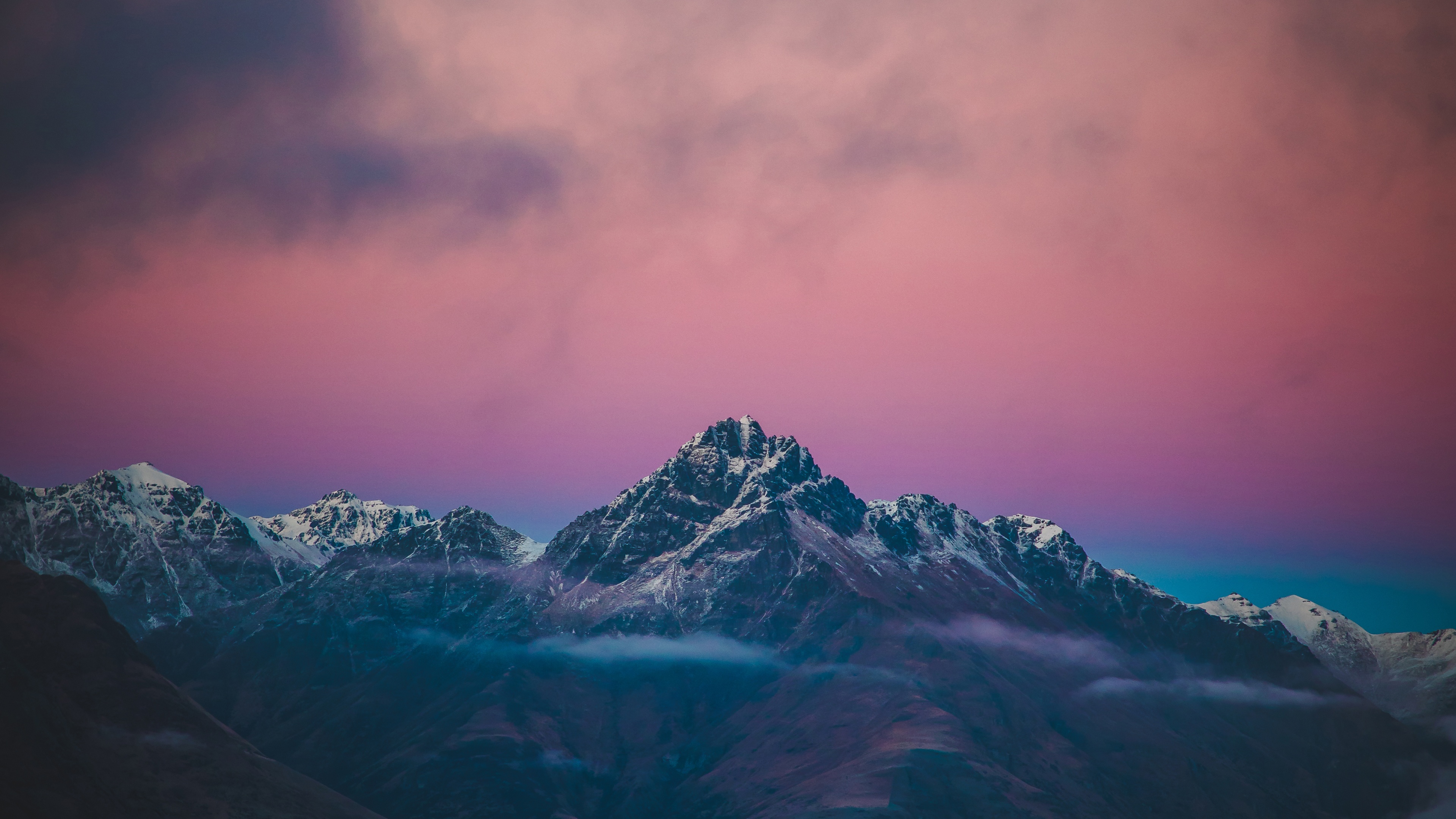 Mountain Peaks with Pink and Purple Clouds HD Wallpaper