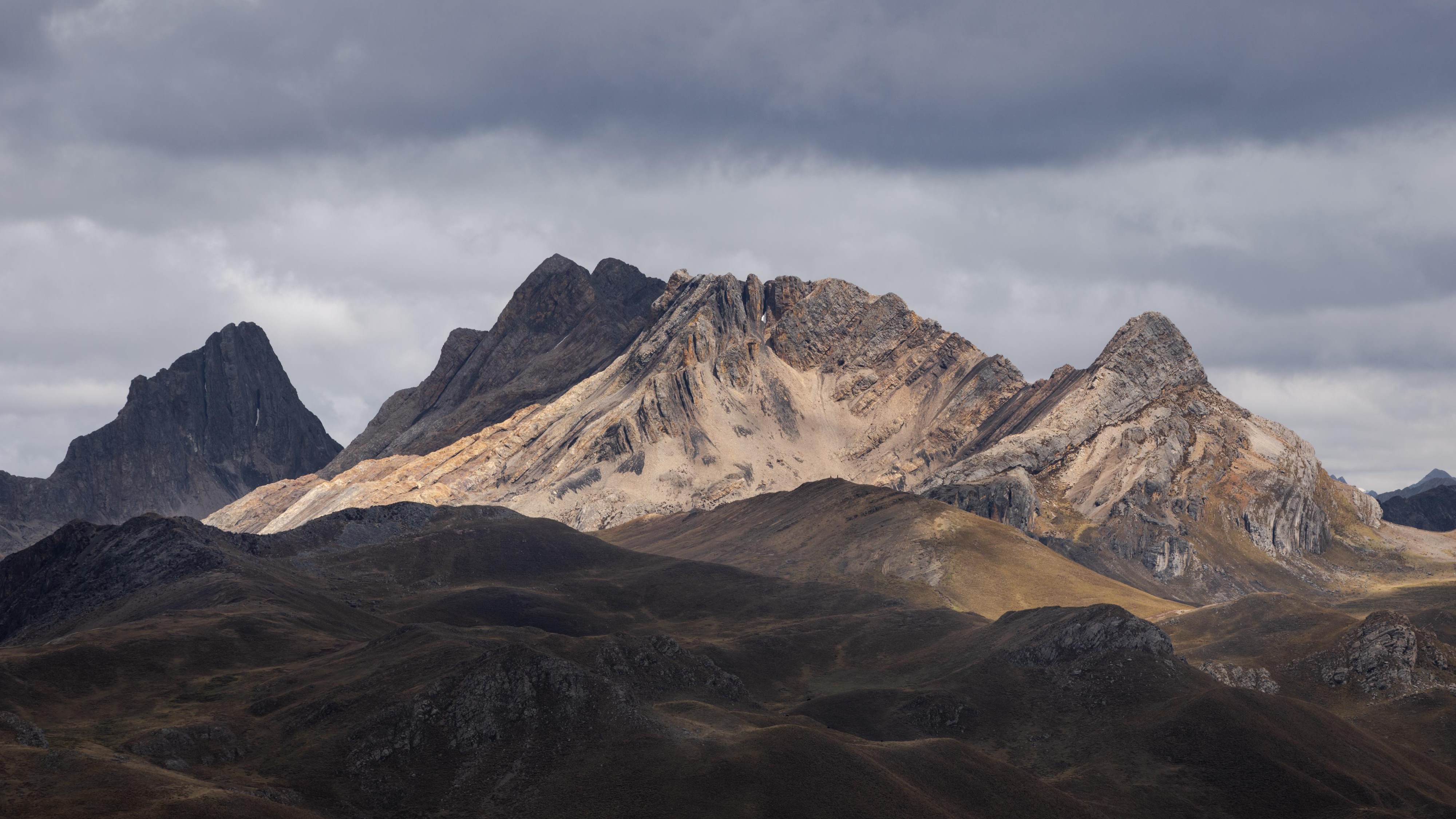 Sun Breaking Through Clouds in Cordillera Huayhuash HD Wallpaper