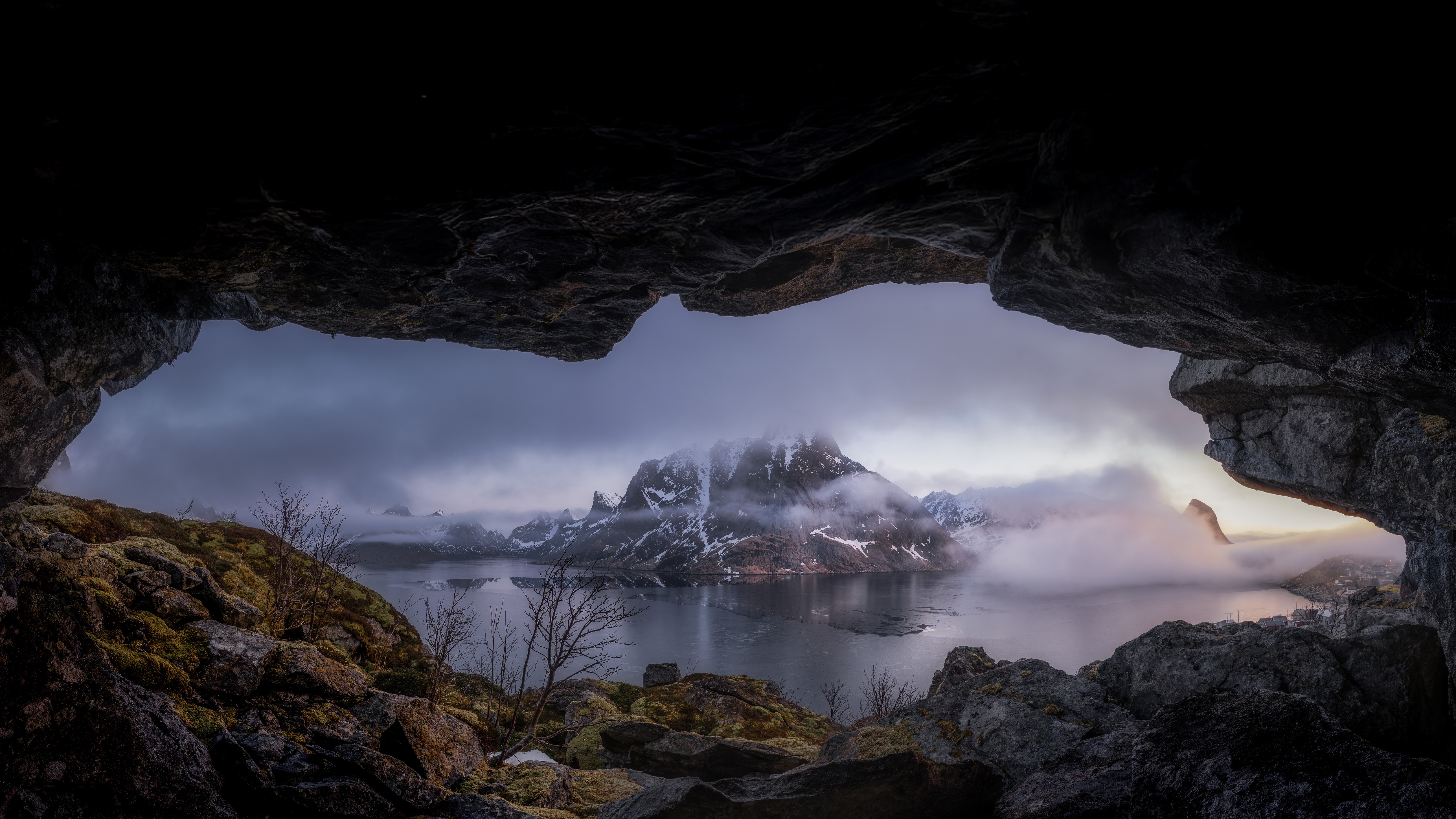 Cave view of foggy mountains and lake in Norway HD Wallpaper