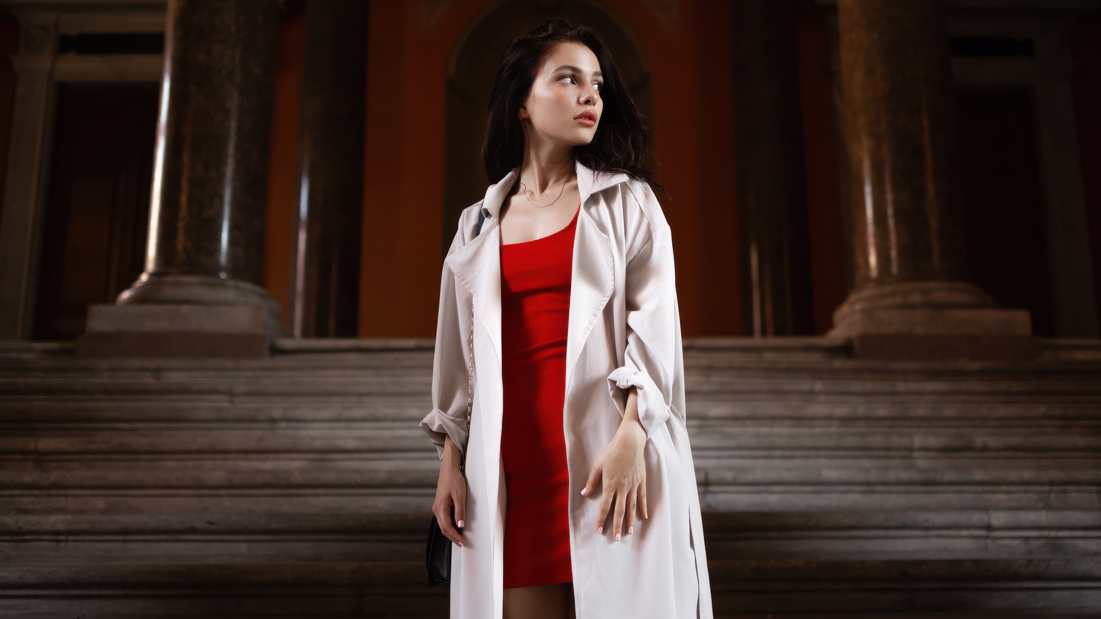 Woman in red dress and long coat on stairs HD Wallpaper