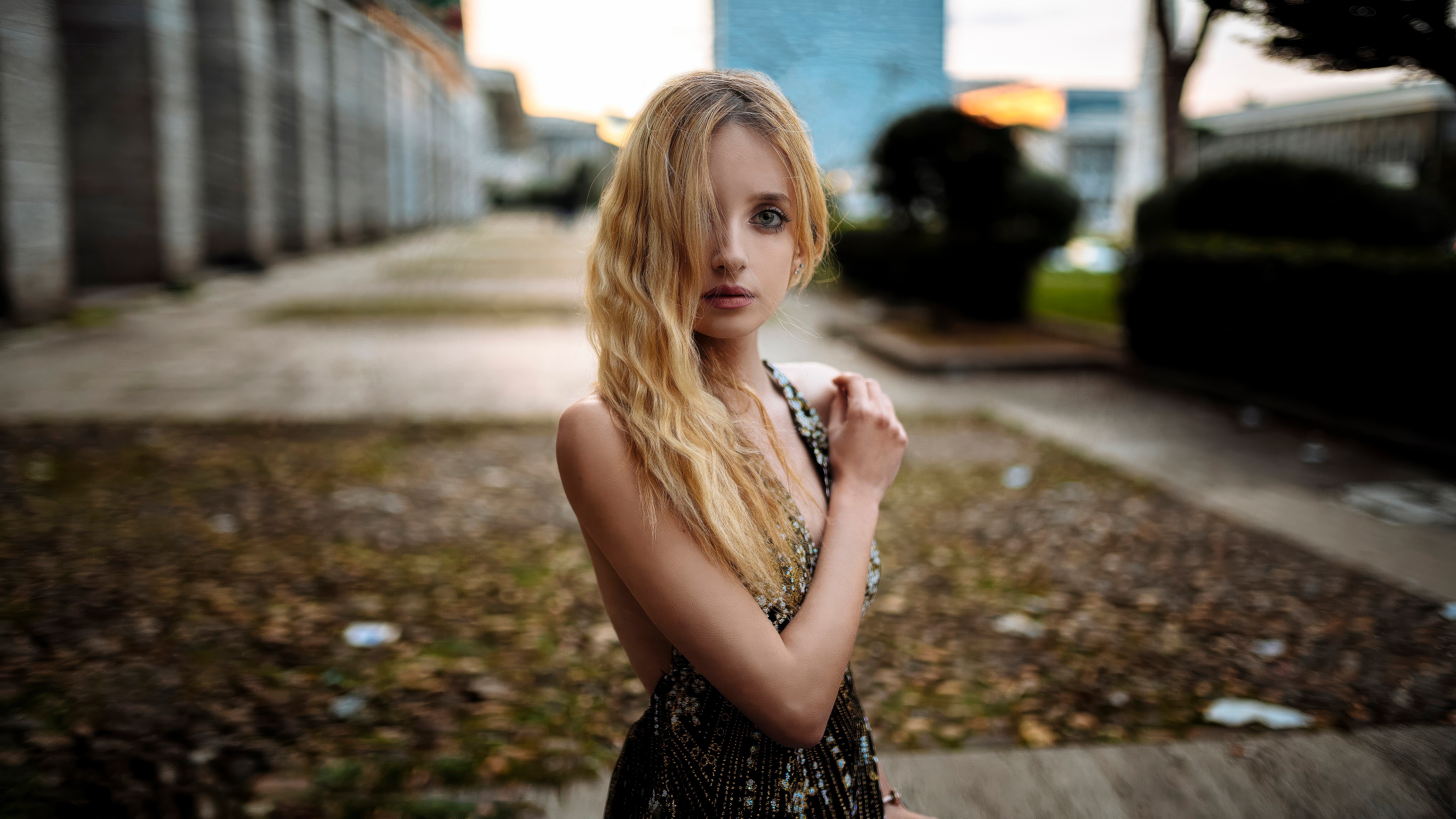 Blonde girl with hair on her face HD Wallpaper