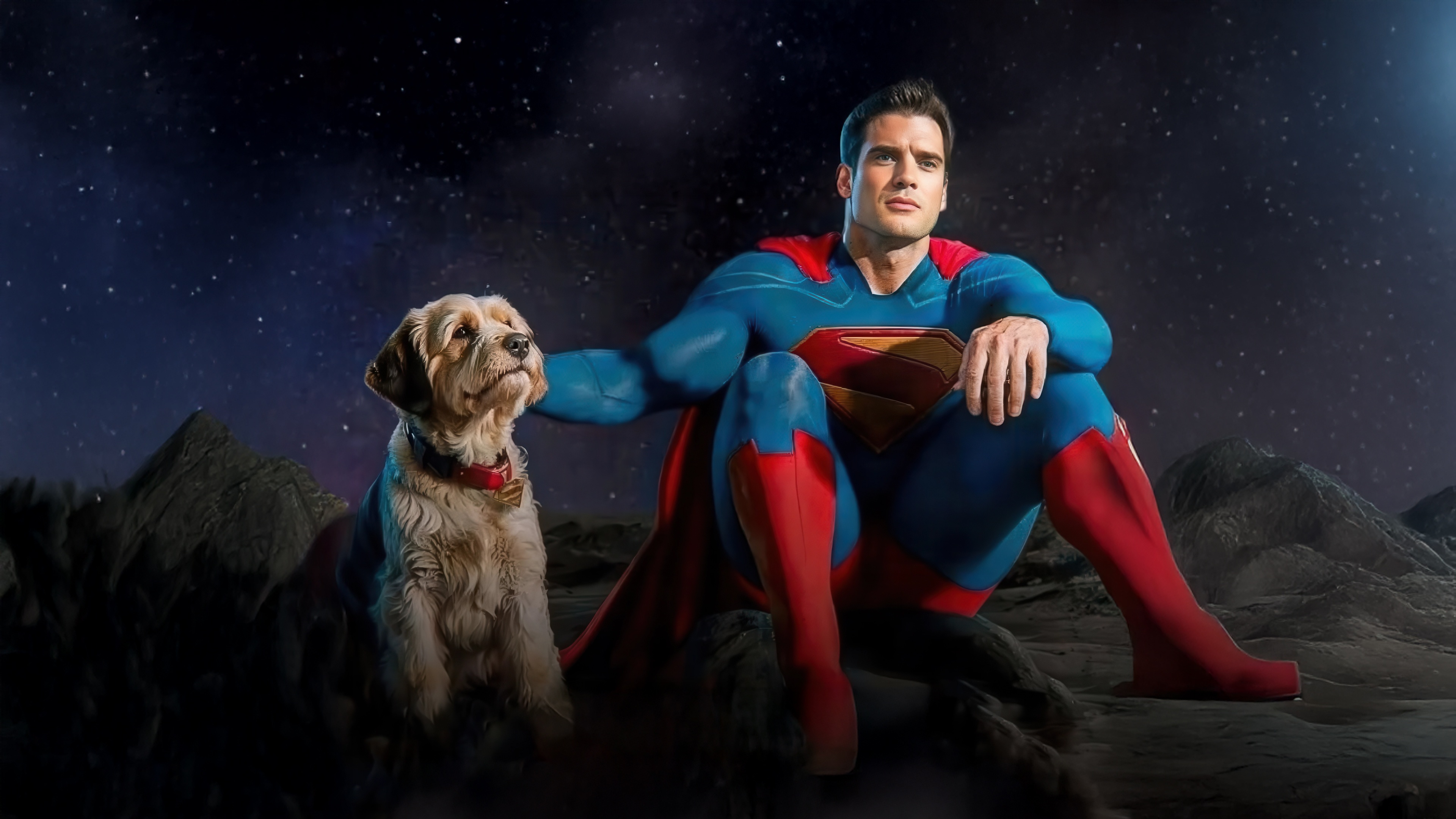 Superman and his dog sitting on a rocky surface under a starry sky HD Wallpaper