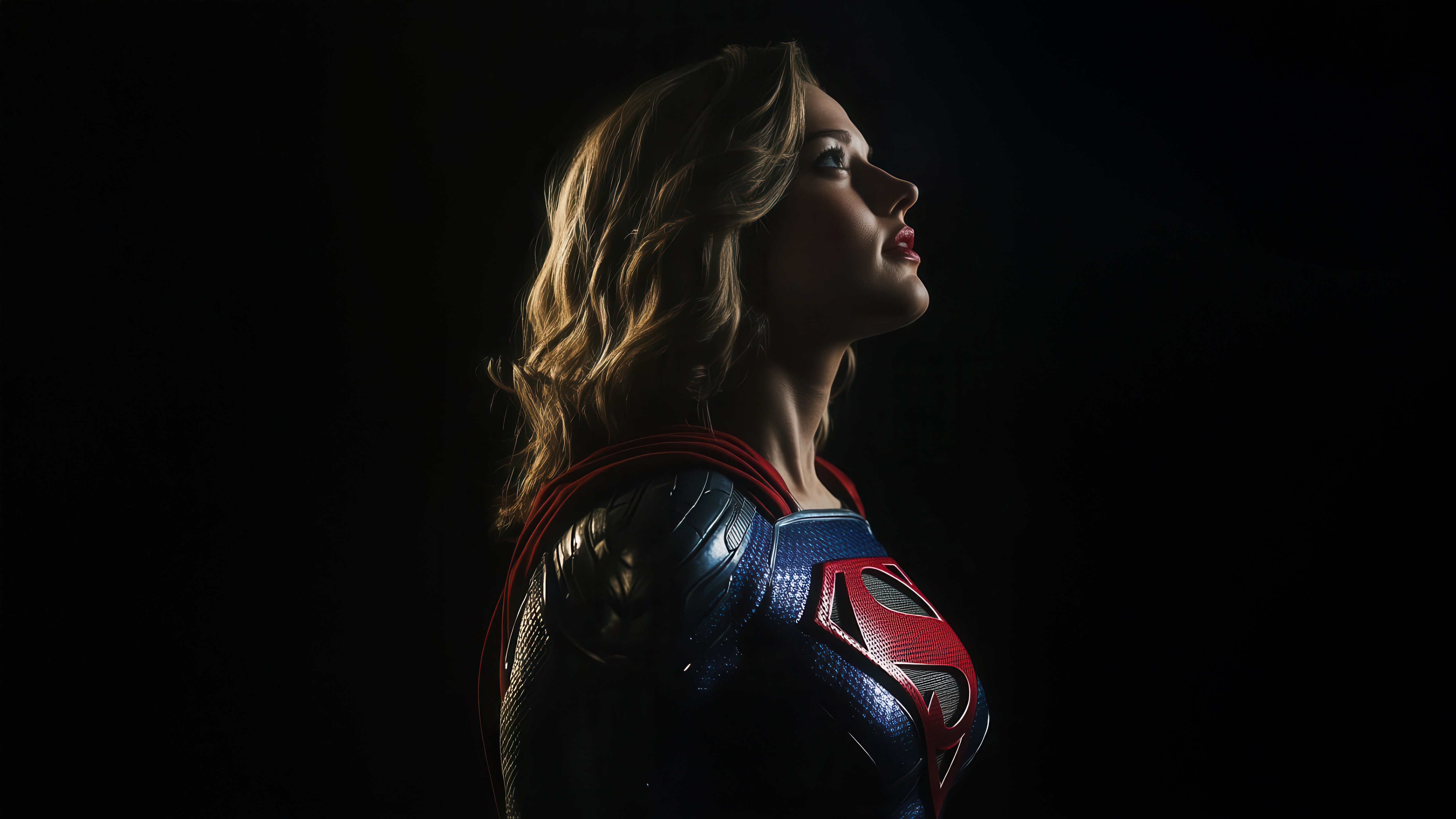 Supergirl in a blue and red costume HD Wallpaper