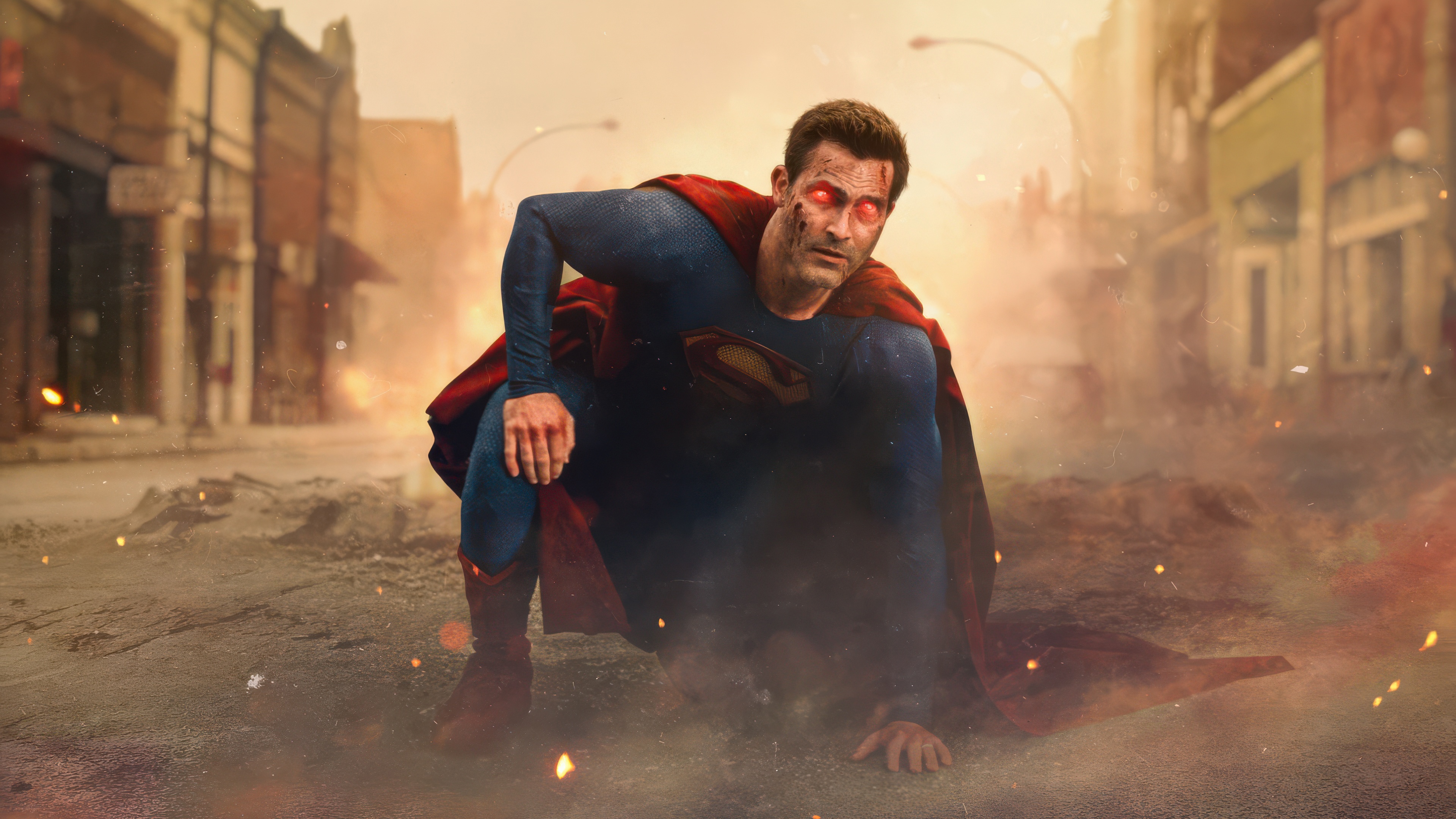 Superman with glowing red eyes in a destroyed town HD Wallpaper