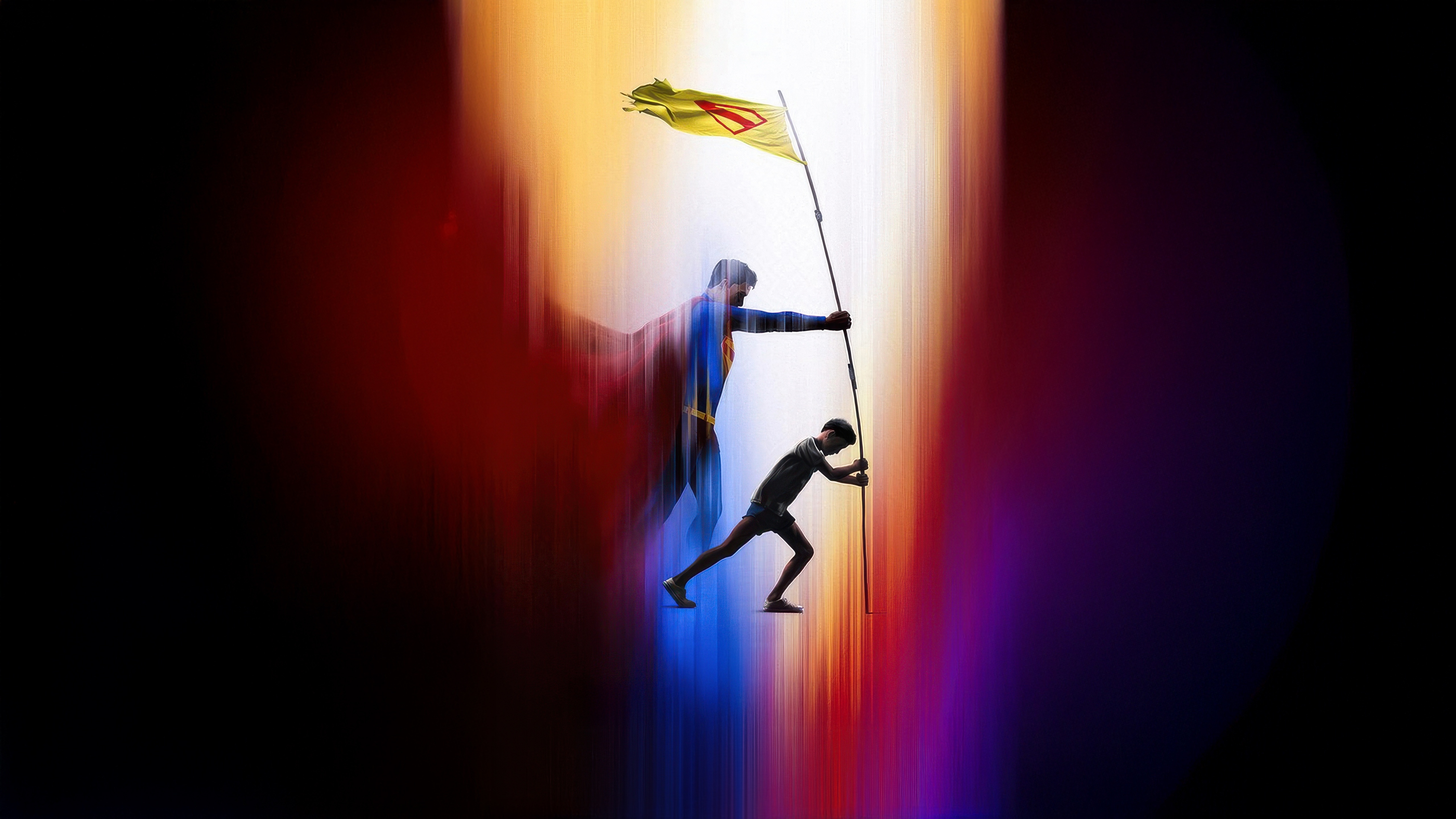 Superman holding a flag with a boy pushing a pole HD Wallpaper