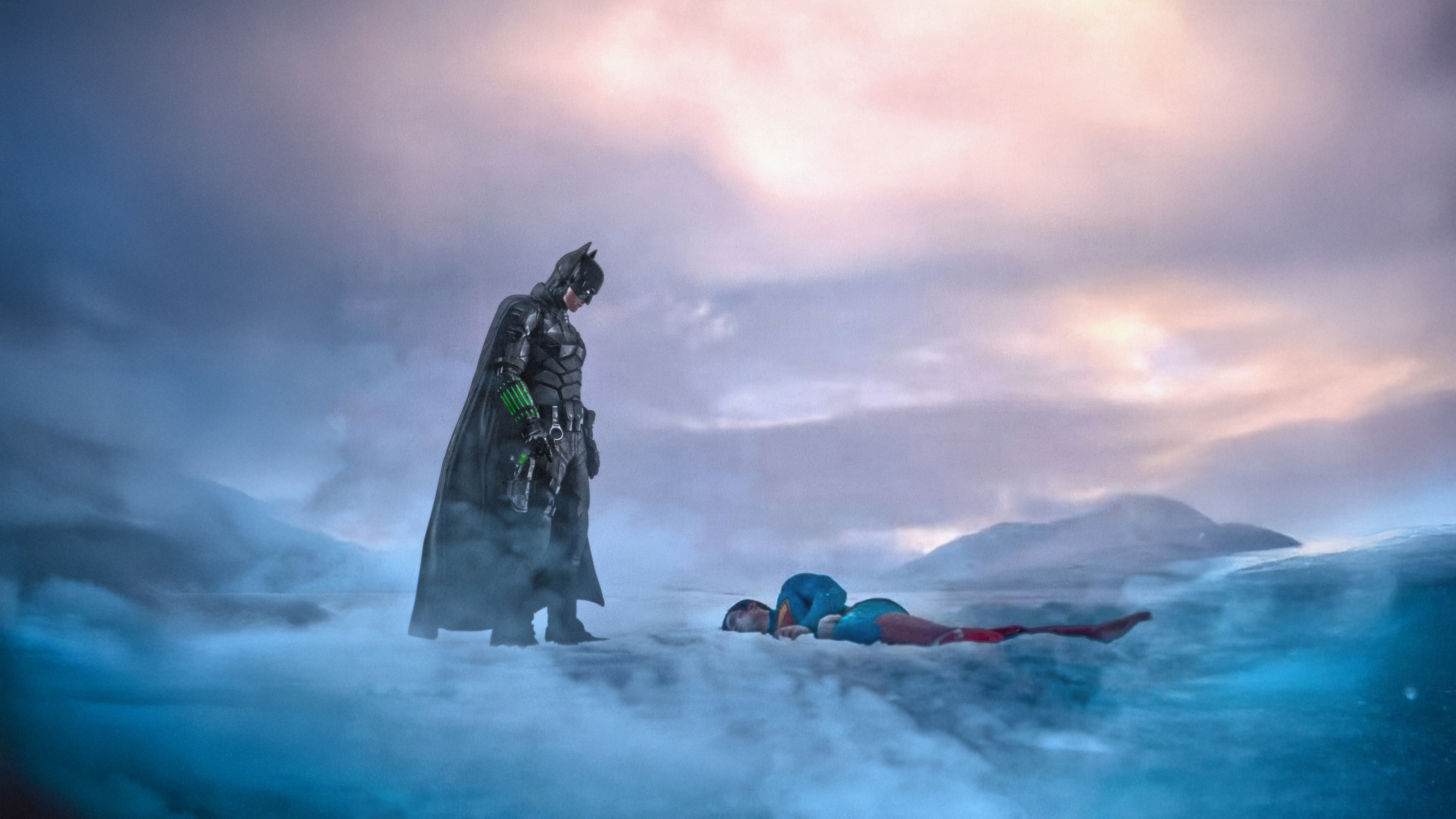 Batman stands over a fallen Superman HD Wallpaper