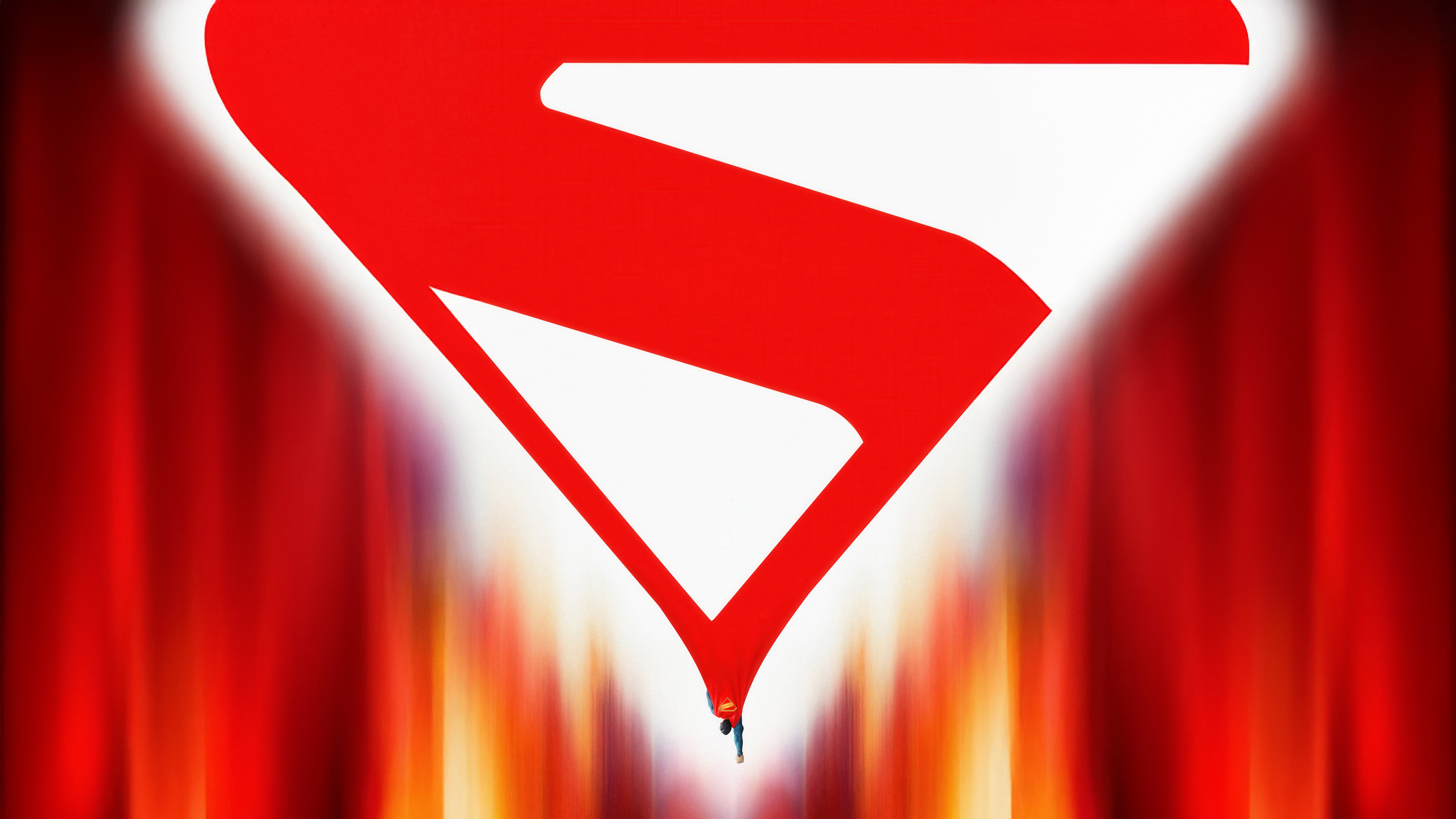 Superman logo with a figure falling HD Wallpaper