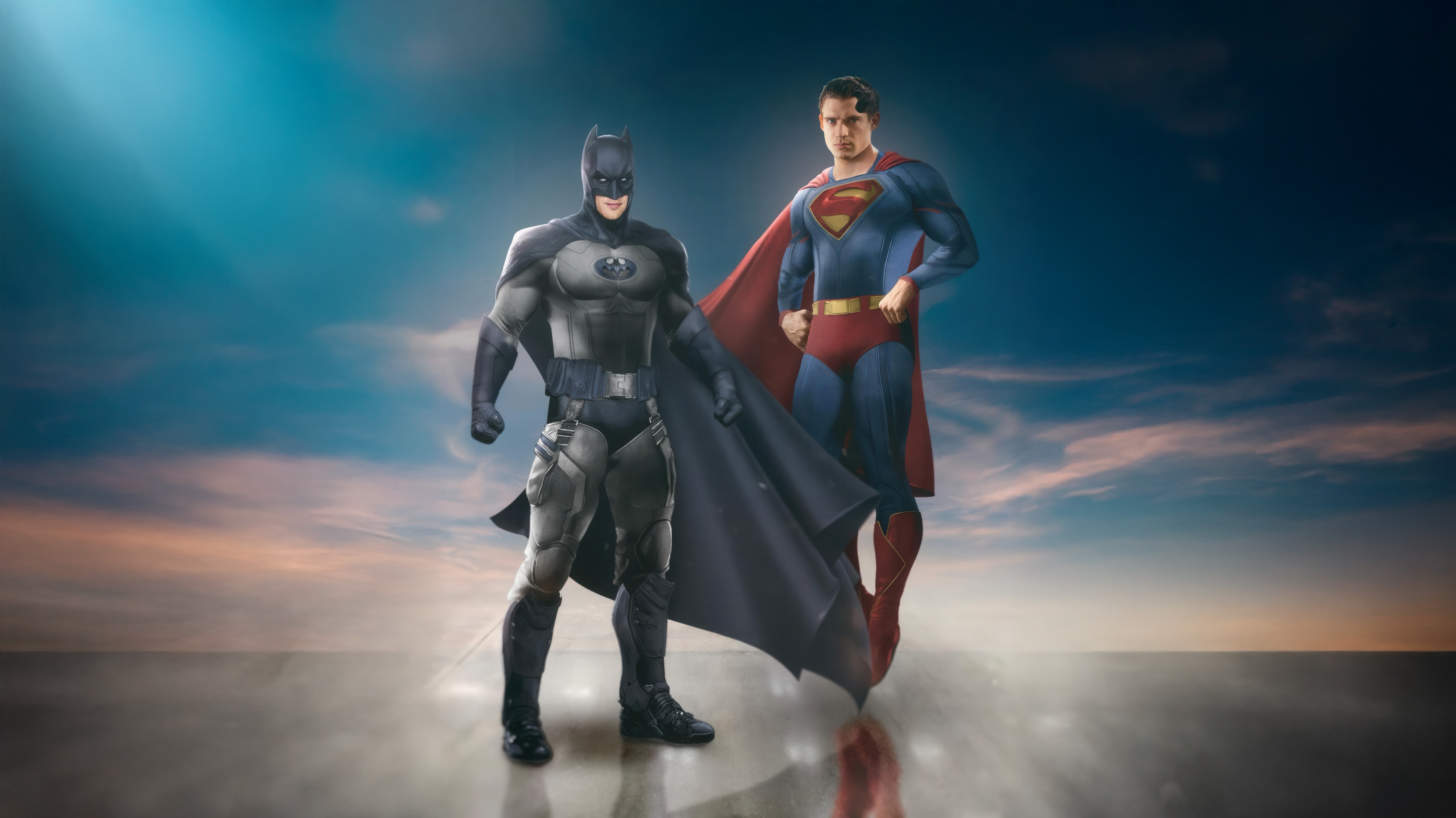 Batman and Superman in a Dramatic Sky HD Wallpaper