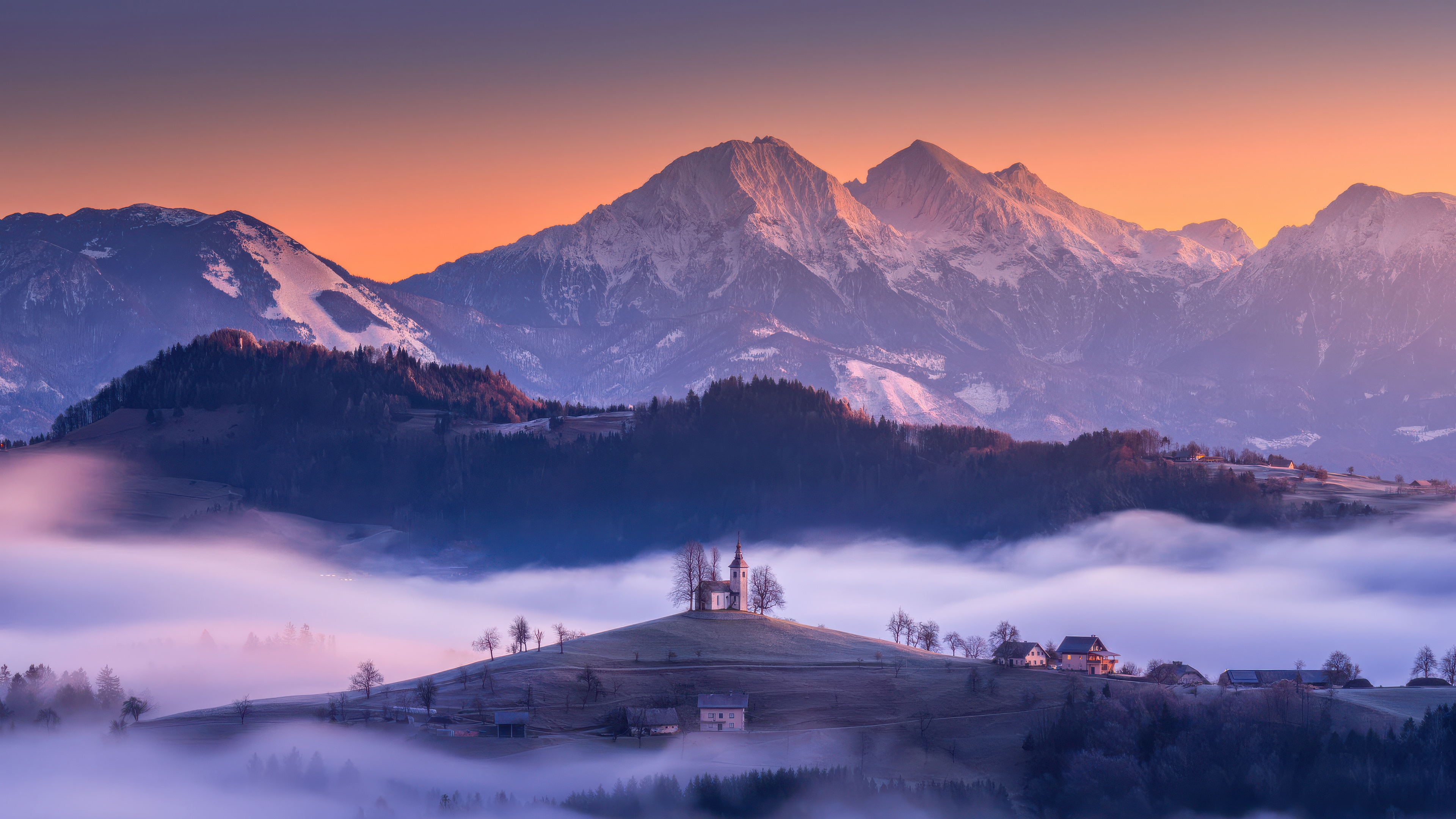 Church on a hill with mountains at sunrise HD Wallpaper