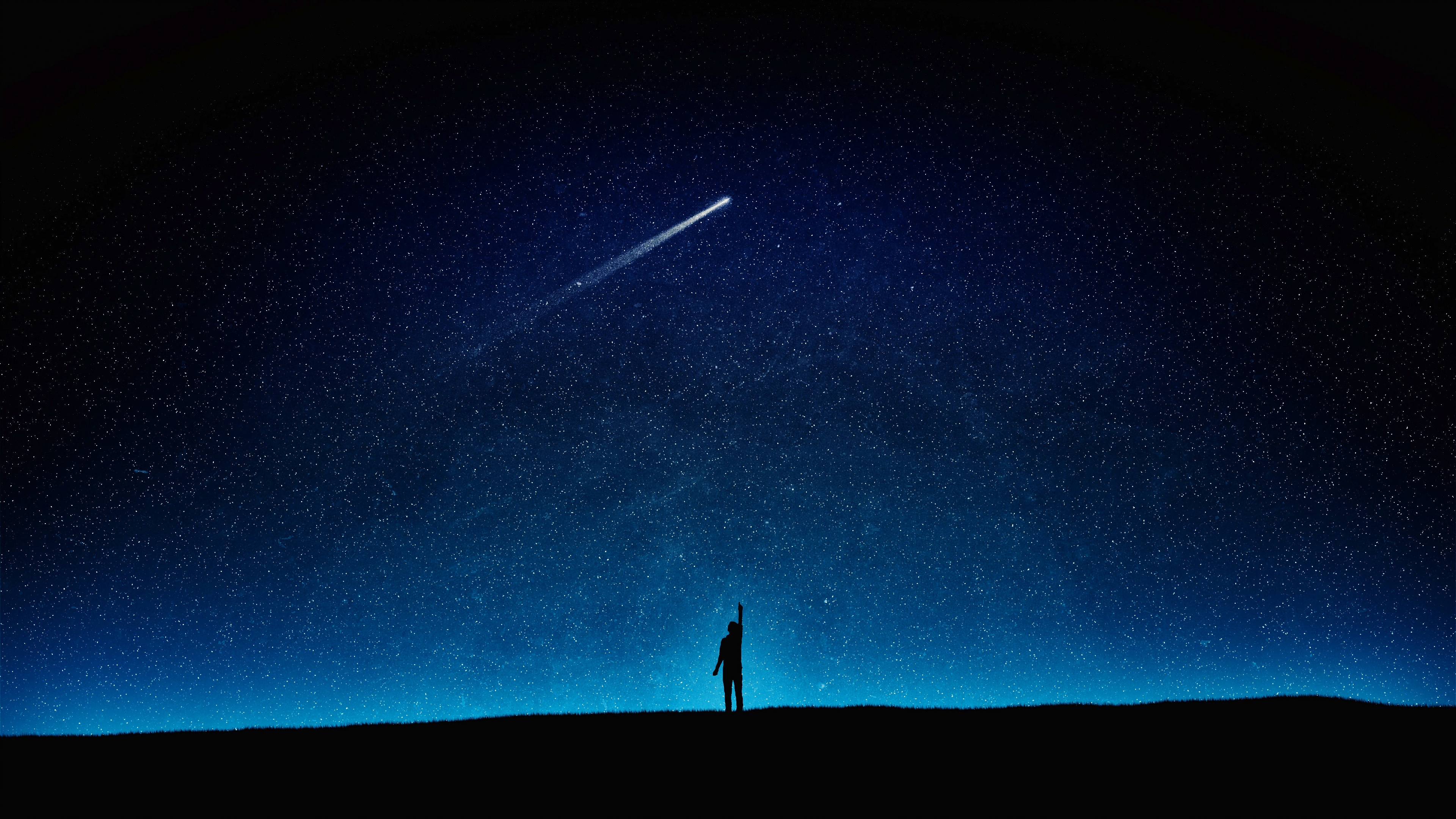 Silhouette of a person reaching for a shooting star HD Wallpaper