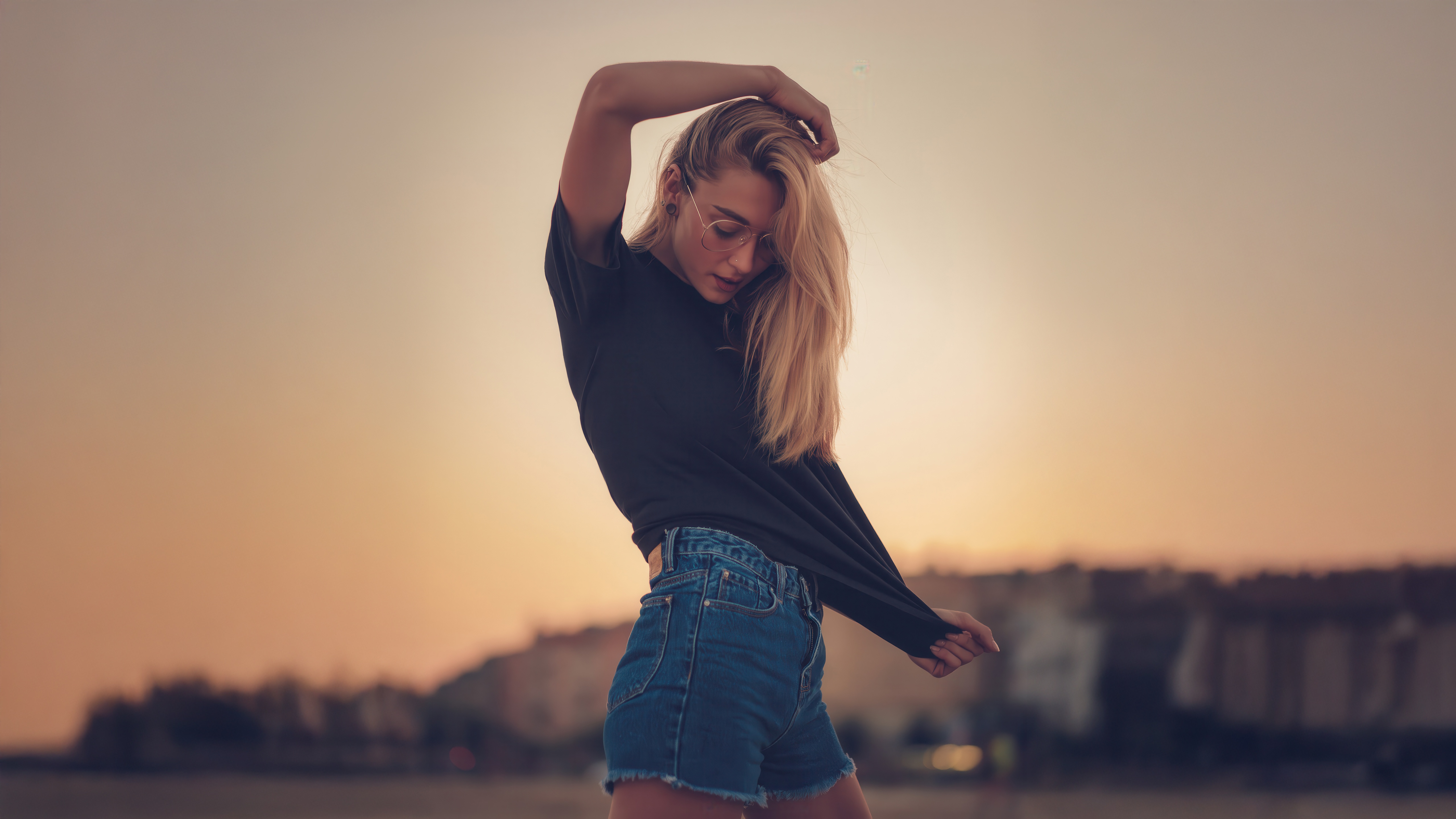 Girl with glasses in black shirt and denim shorts HD Wallpaper