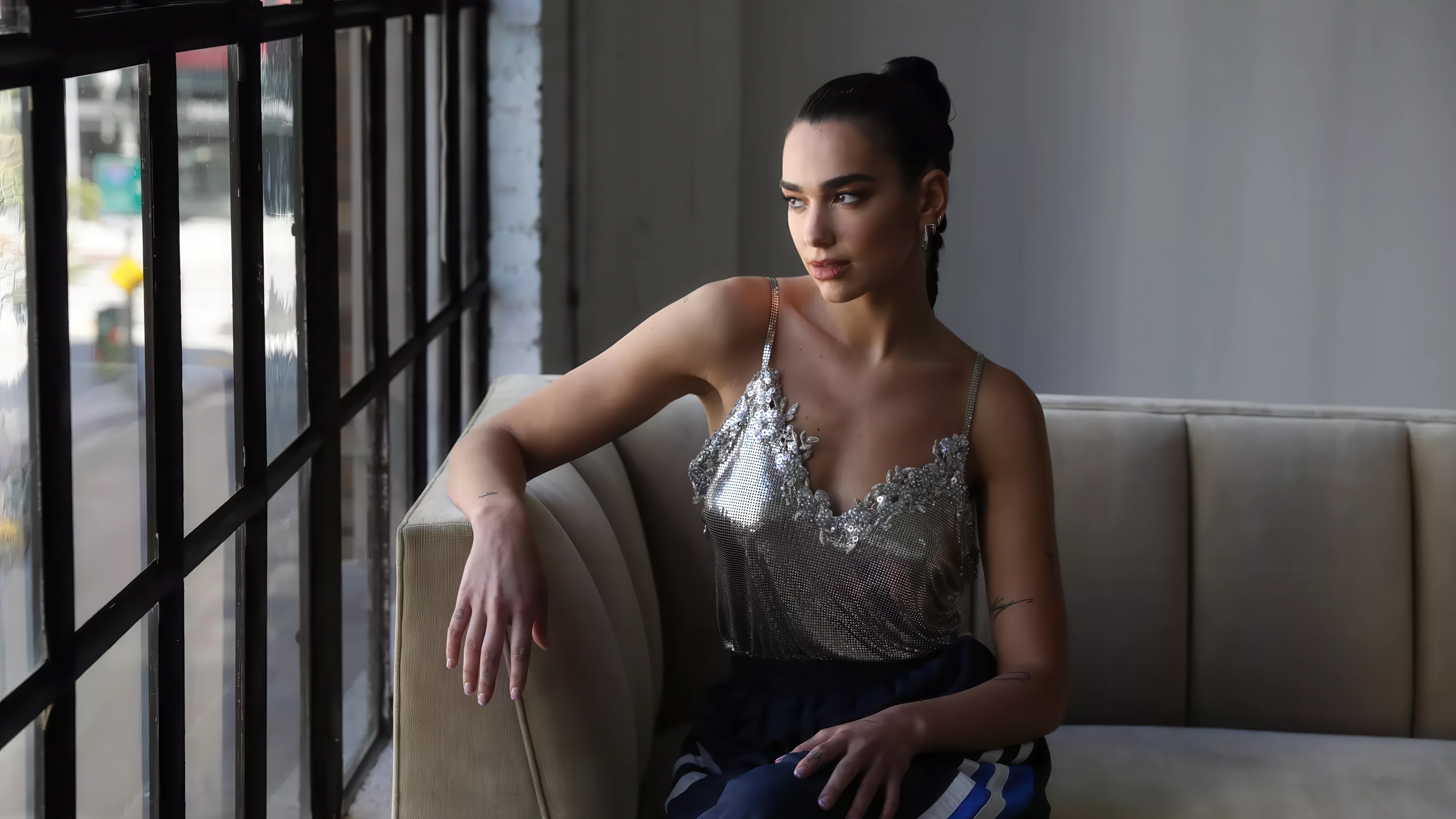 Dua Lipa in a silver top HD Wallpaper