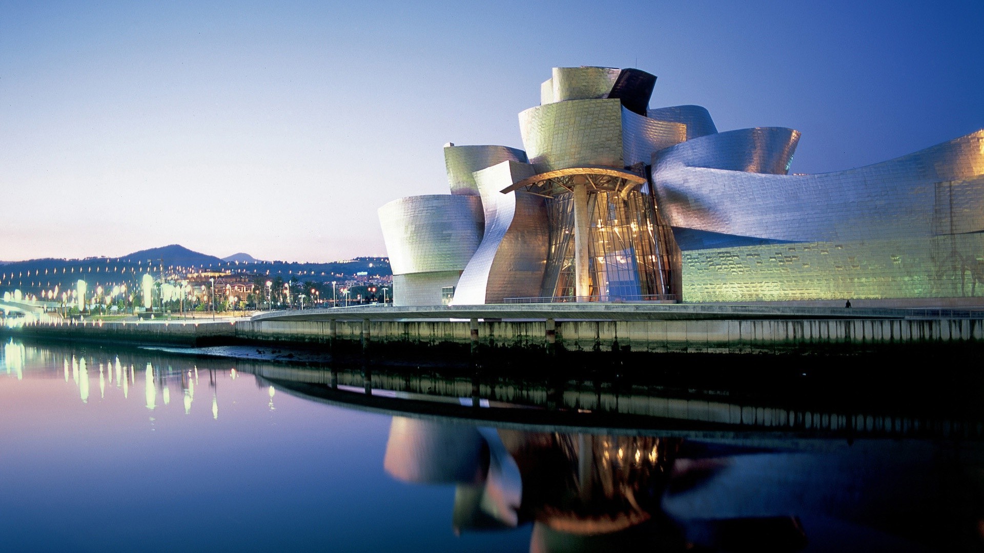 Guggenheim Museum Bilbao by the river at dusk HD Wallpaper