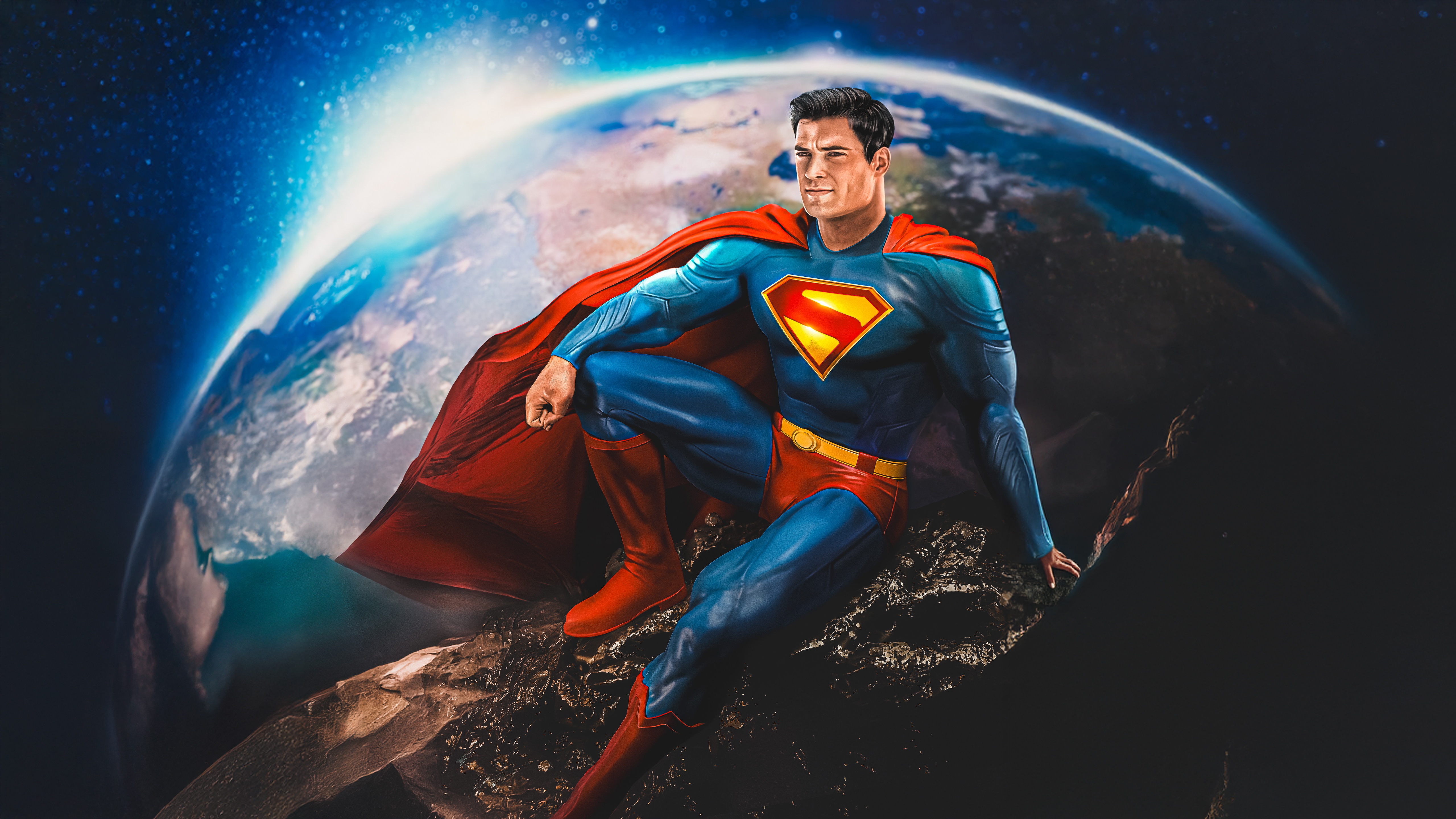 Superman Sitting on Rocks with Earth in Background HD Wallpaper