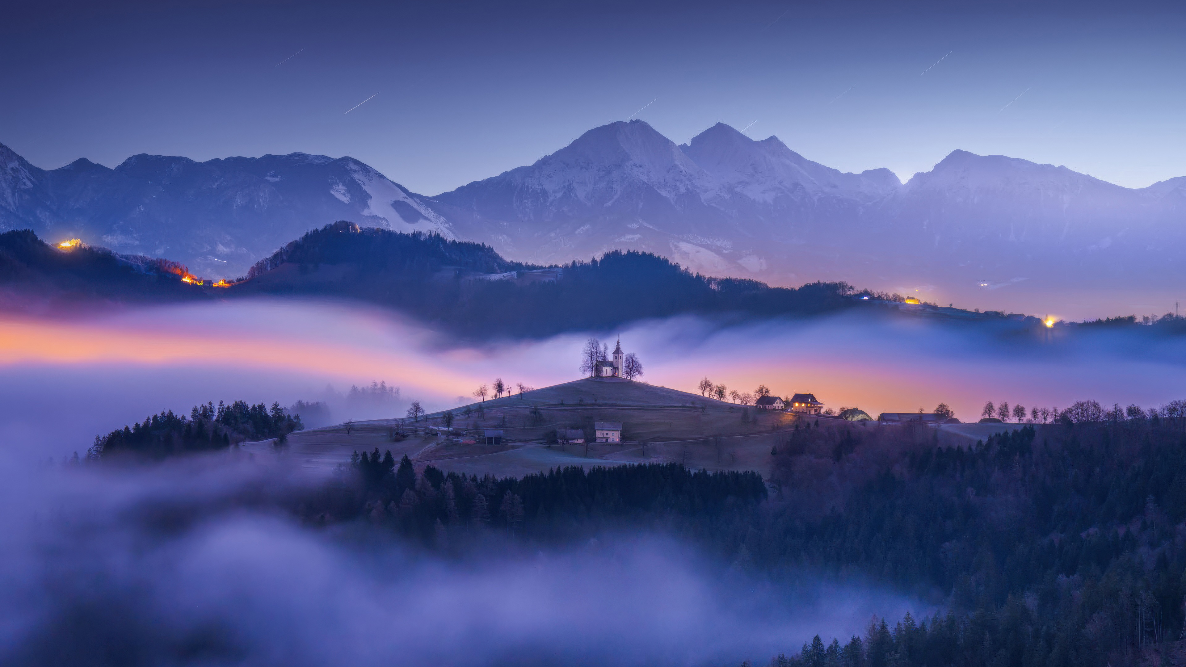 Mountain church on a hill at dawn with fog HD Wallpaper