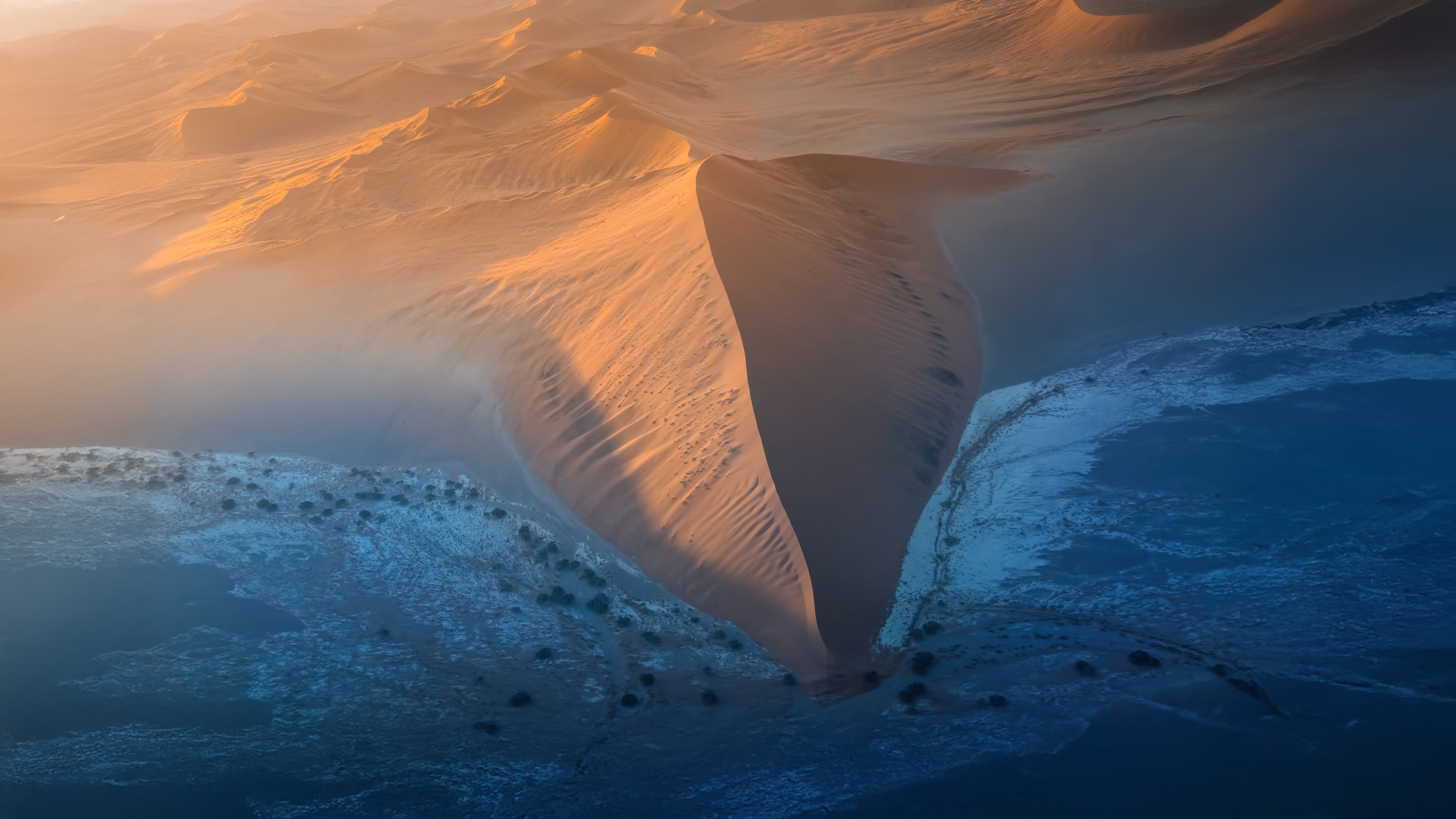 Aerial view of sand dunes at sunrise HD Wallpaper