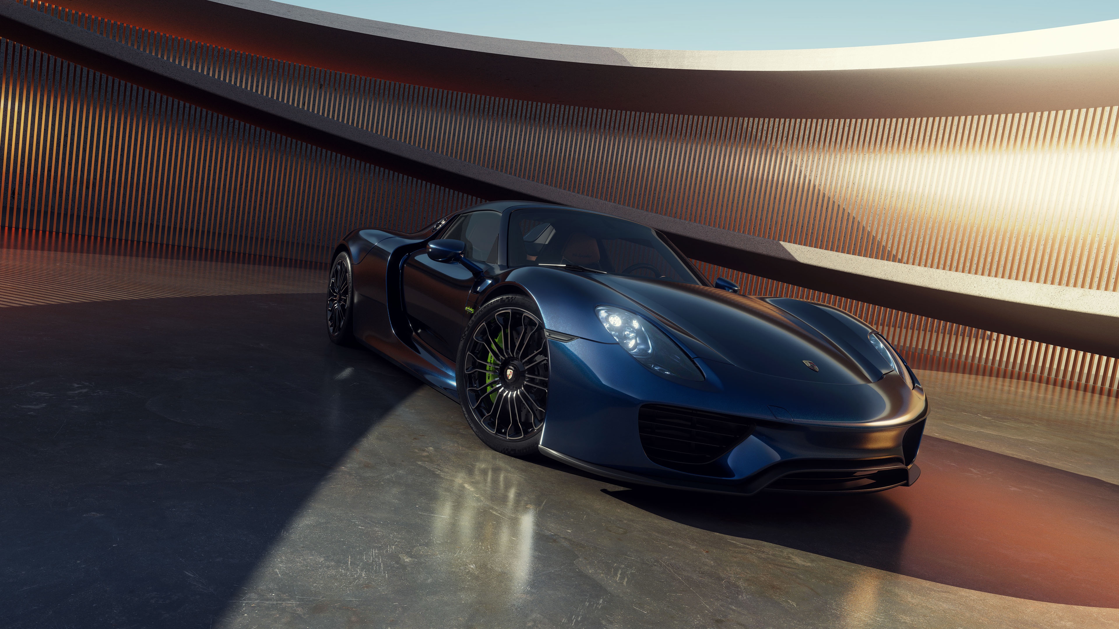 Blue Porsche 918 Spyder in a modern showroom HD Wallpaper