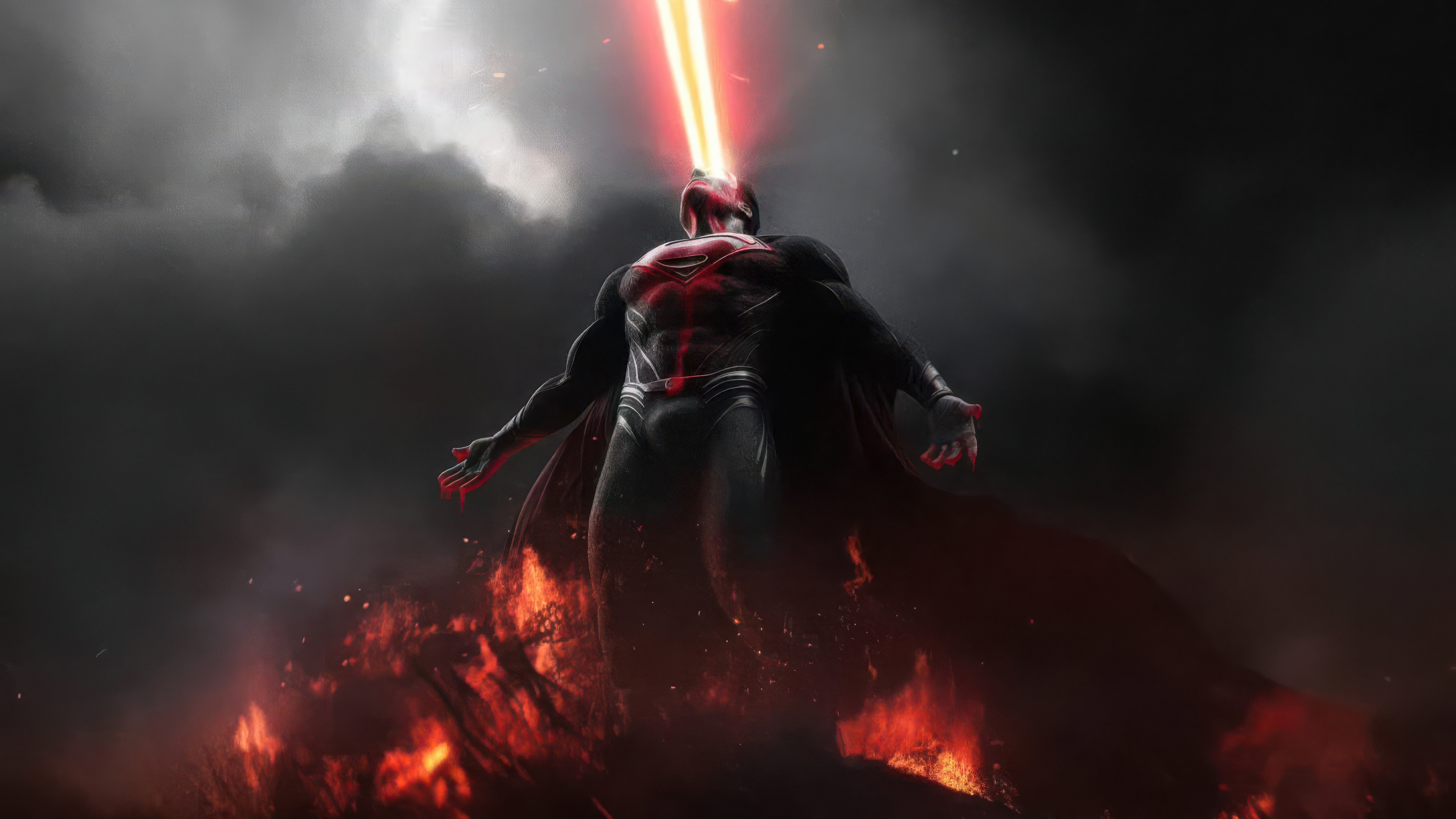 Superman uses heat vision in a fiery landscape HD Wallpaper