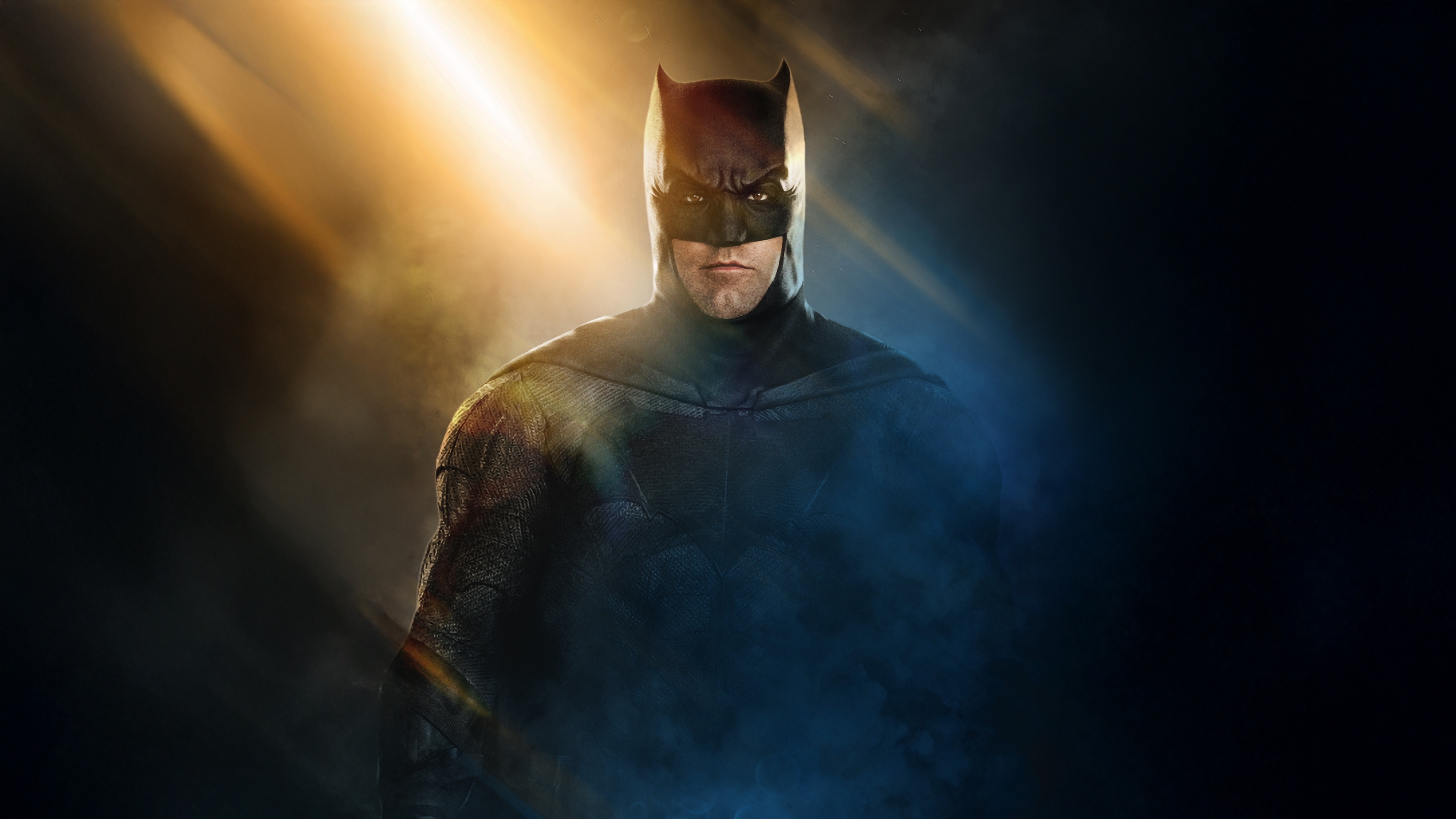 Batman in a dark suit with dramatic lighting HD Wallpaper