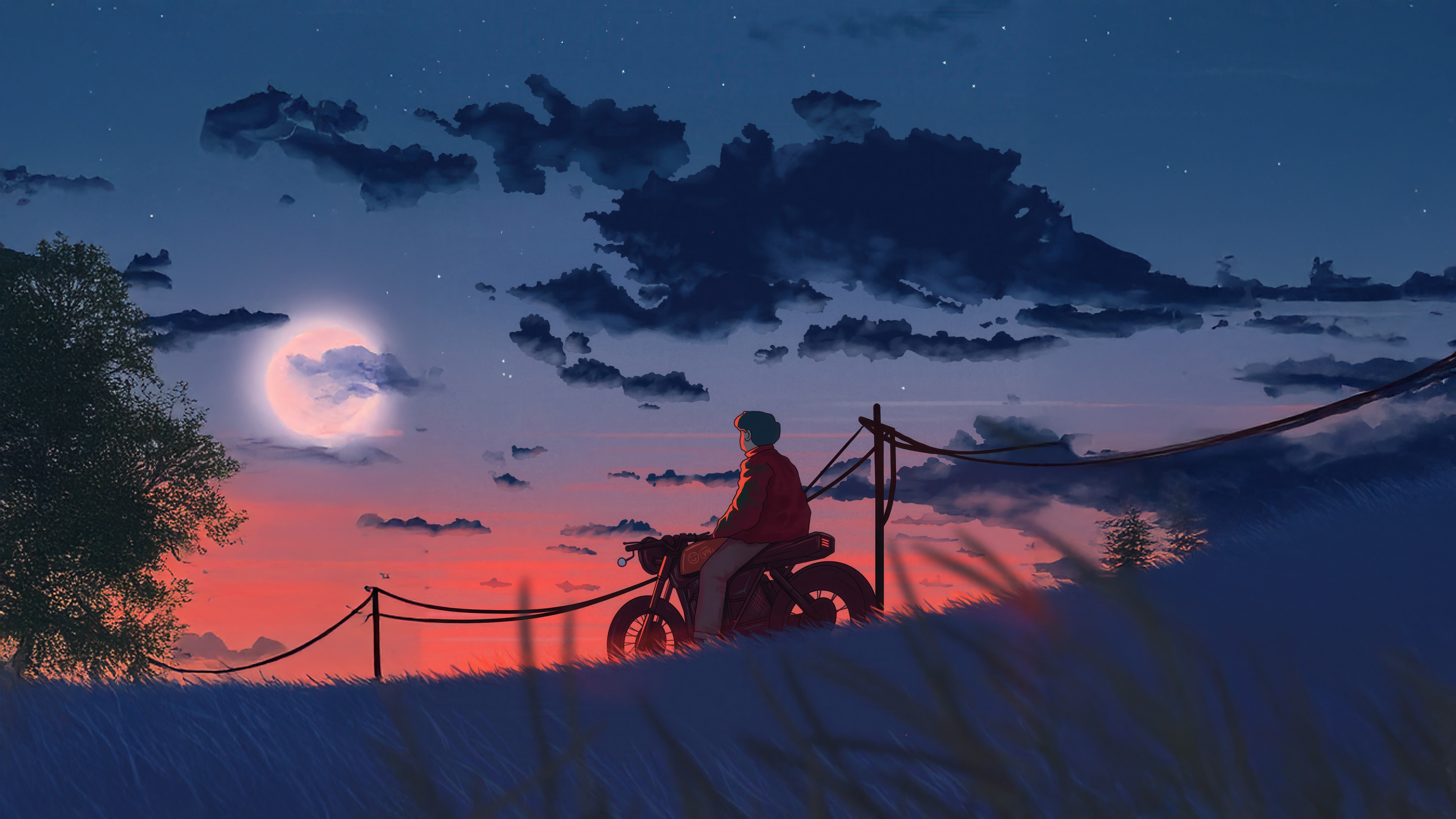 A lone rider on a motorcycle watches the sunset HD Wallpaper
