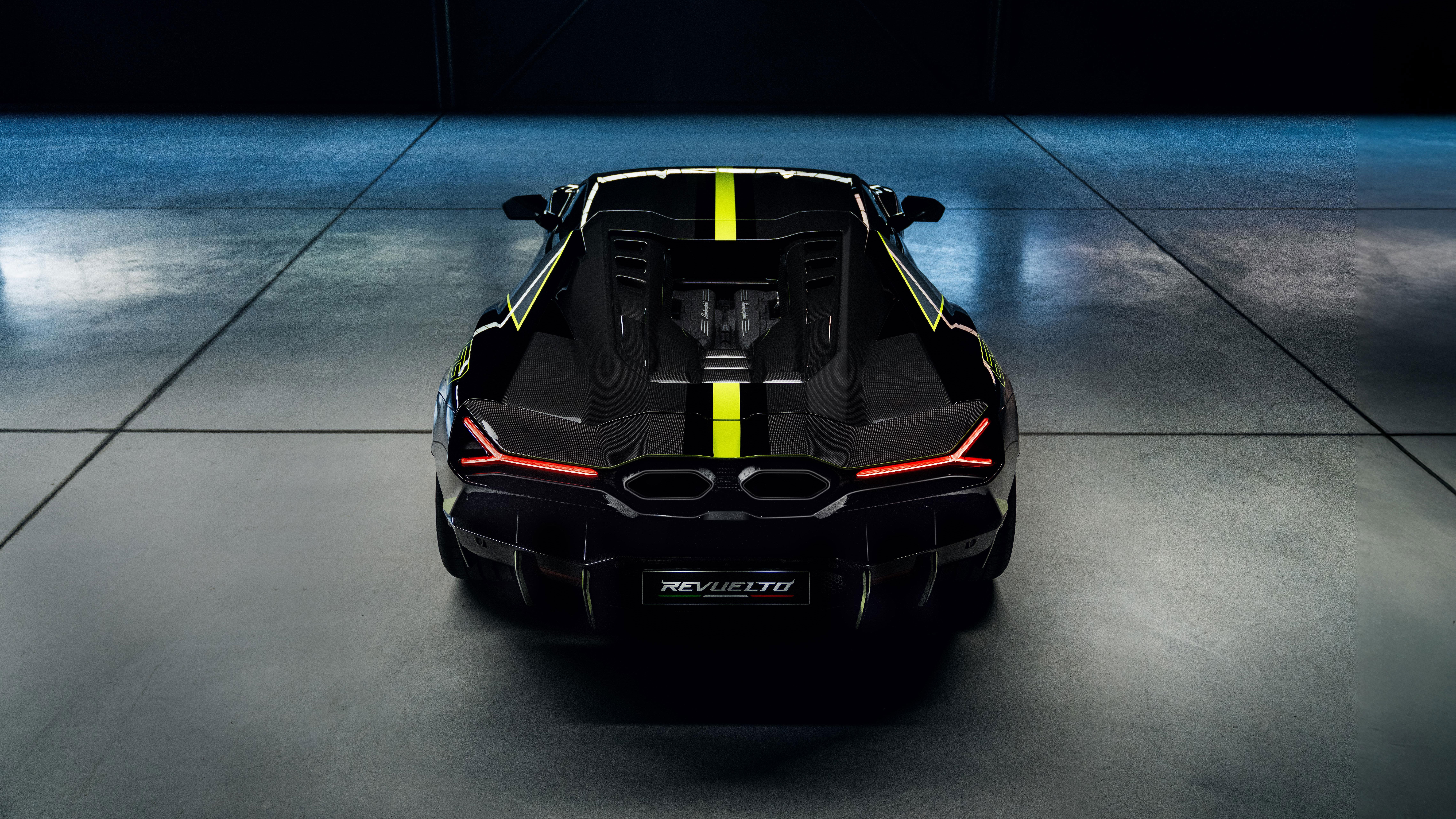 Lamborghini Revuelto rear view with yellow stripes HD Wallpaper