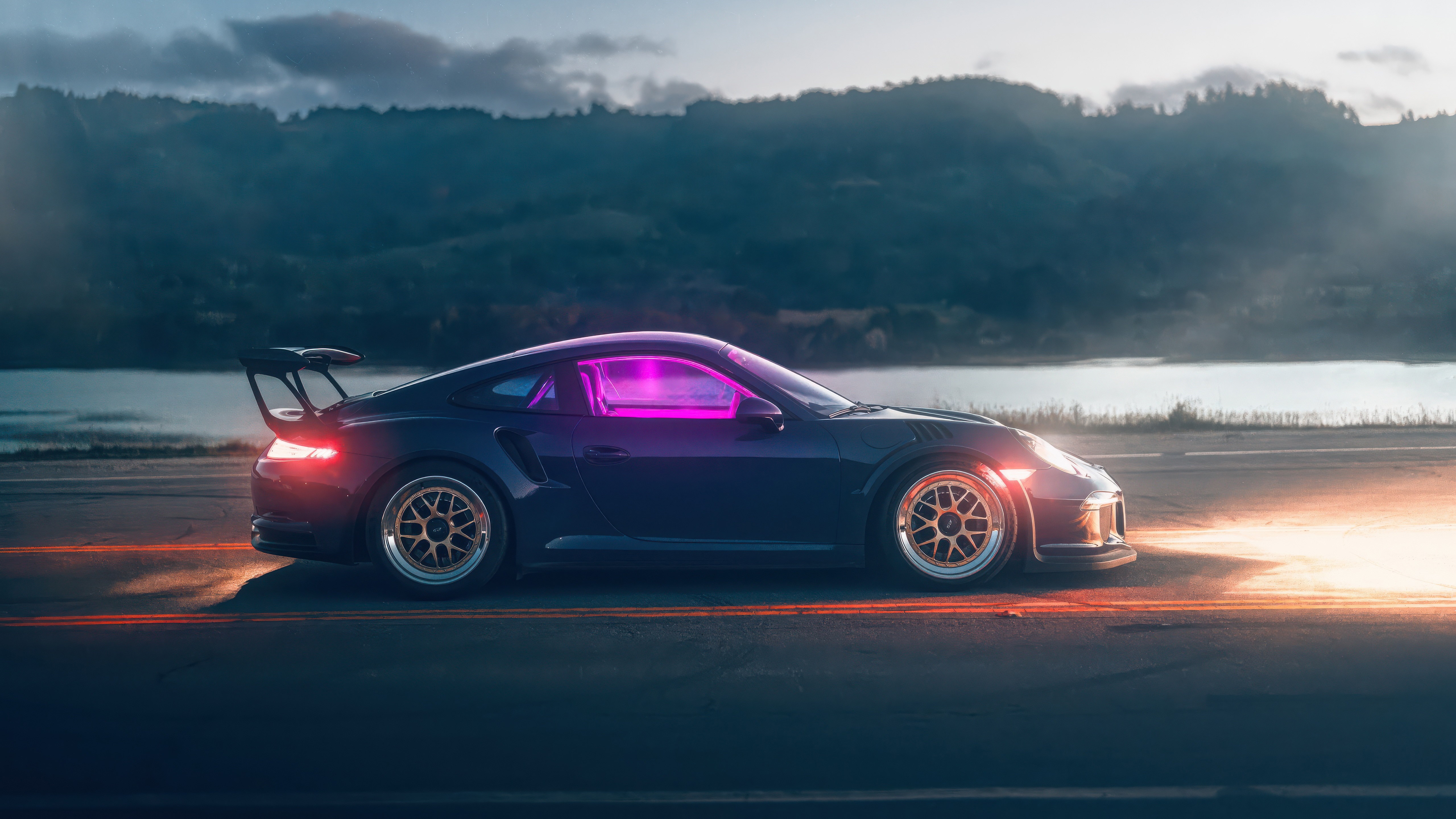 Porsche GT3 RS with purple interior on a road HD Wallpaper