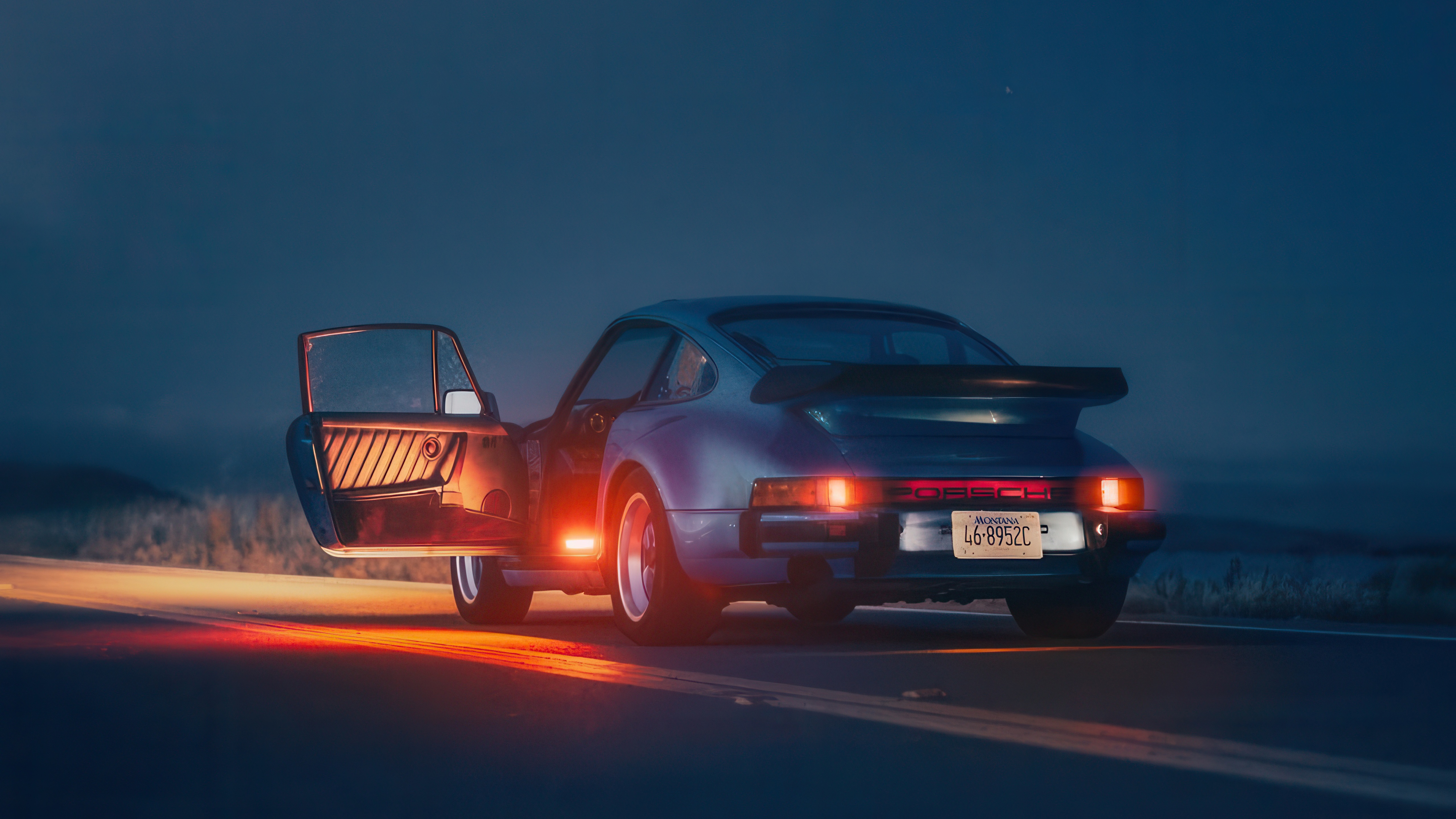 Porsche 911 parked on a road at night HD Wallpaper
