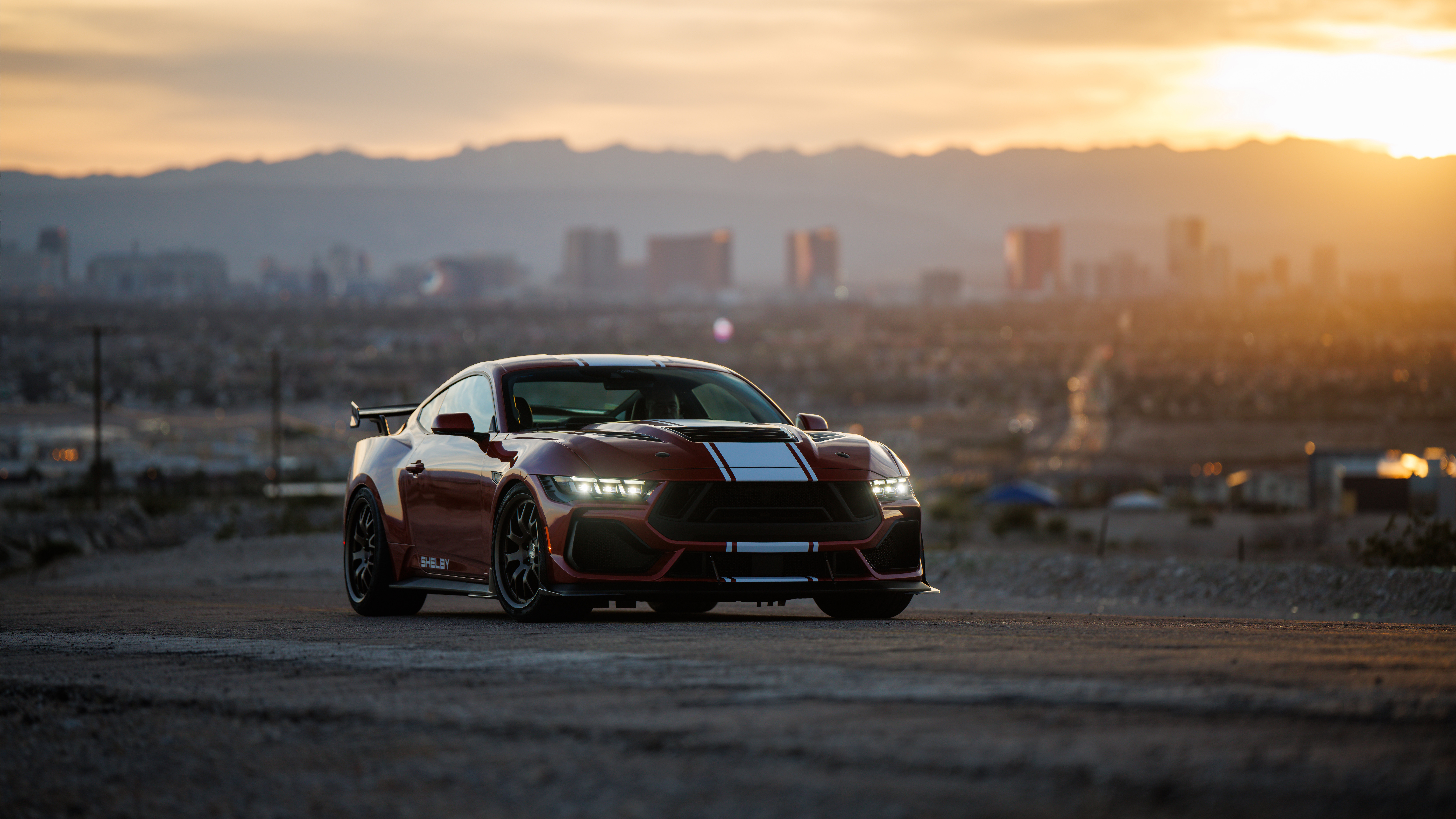 Red Shelby Super Snake Mustang in a desert landscape HD Wallpaper