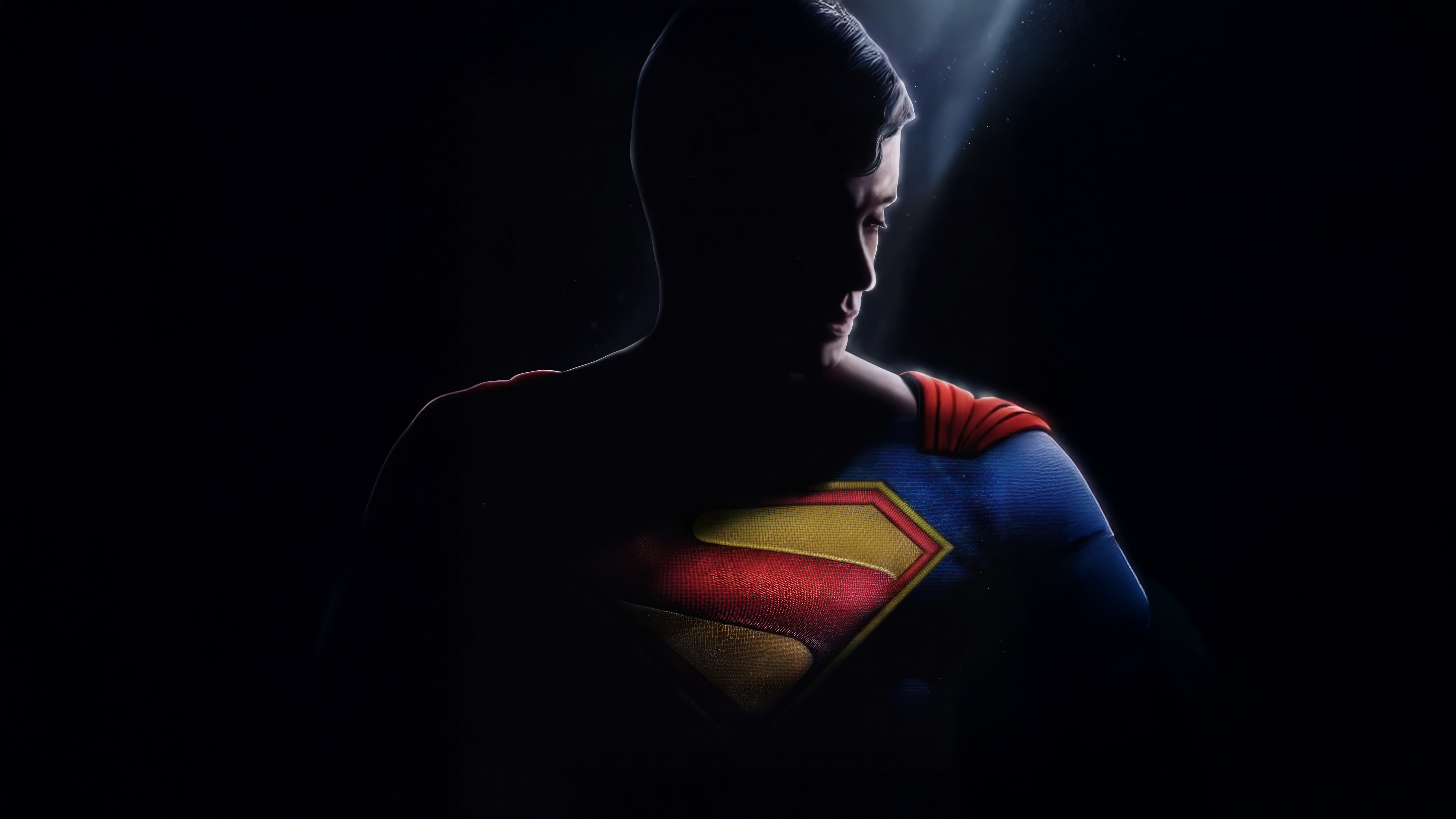 Superman's iconic S-shield emblem in silhouette HD Wallpaper