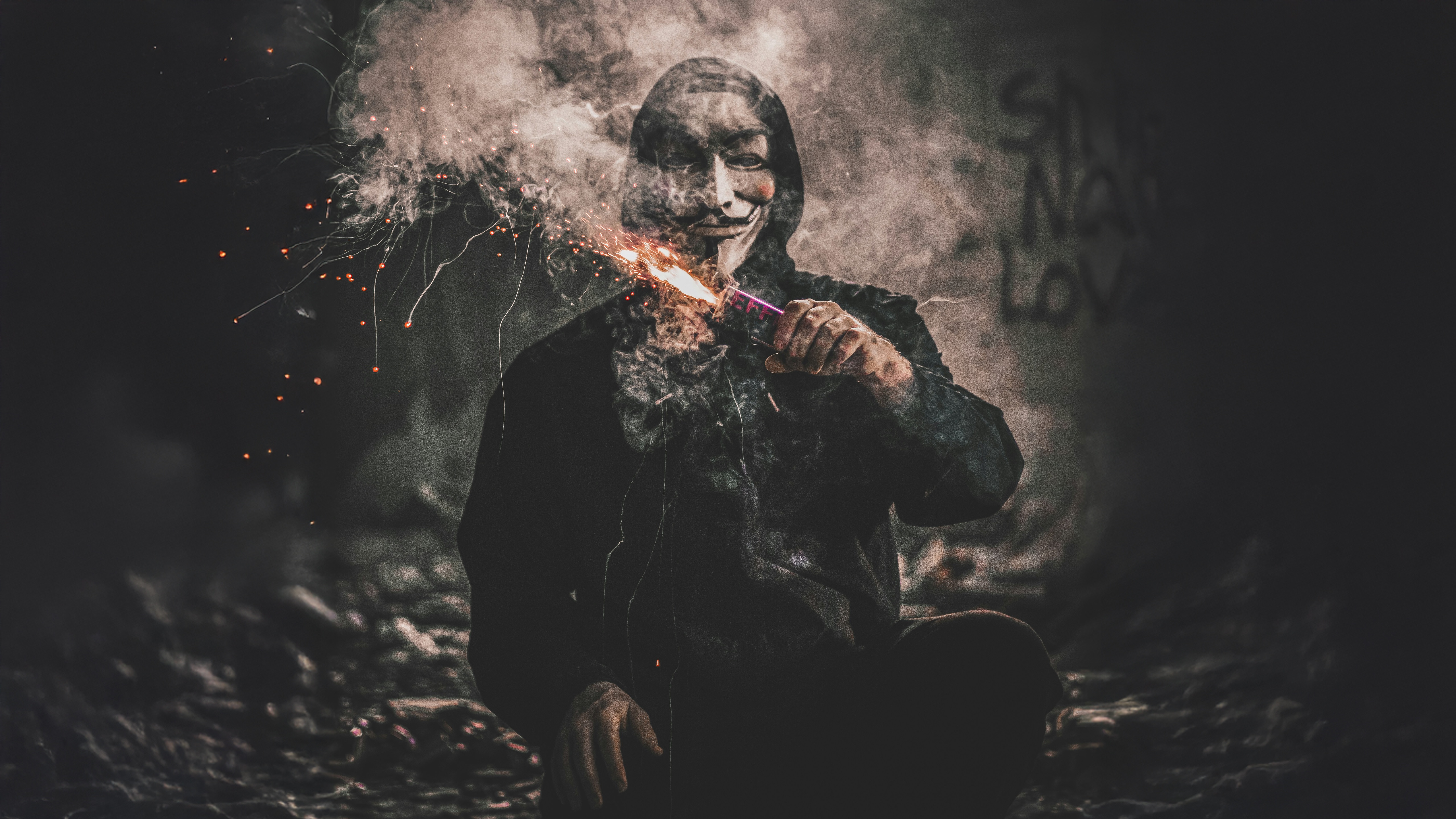 Anonymous Maskman with a lit flare HD Wallpaper