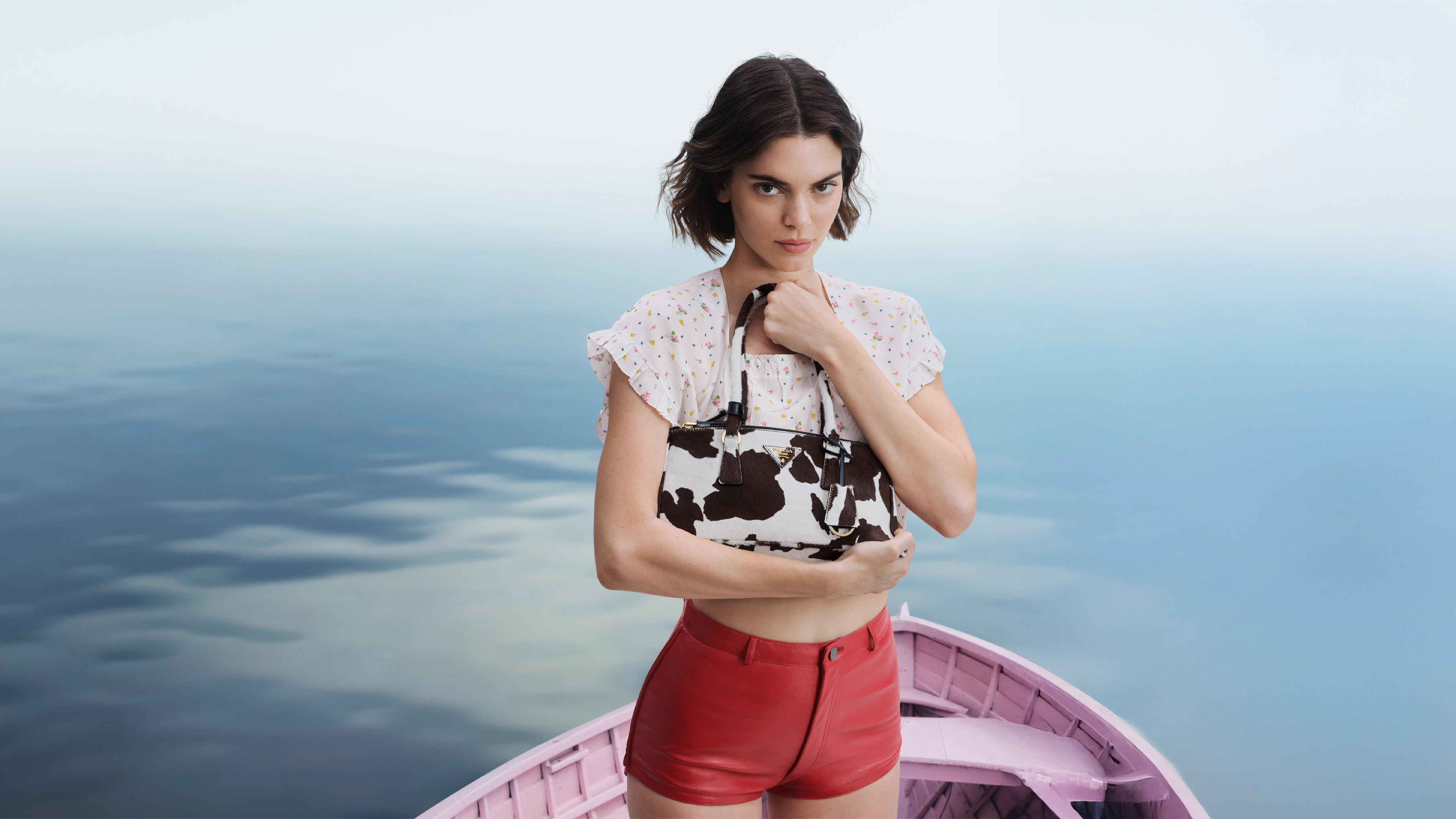 Kendall Jenner with Prada bag in a boat HD Wallpaper