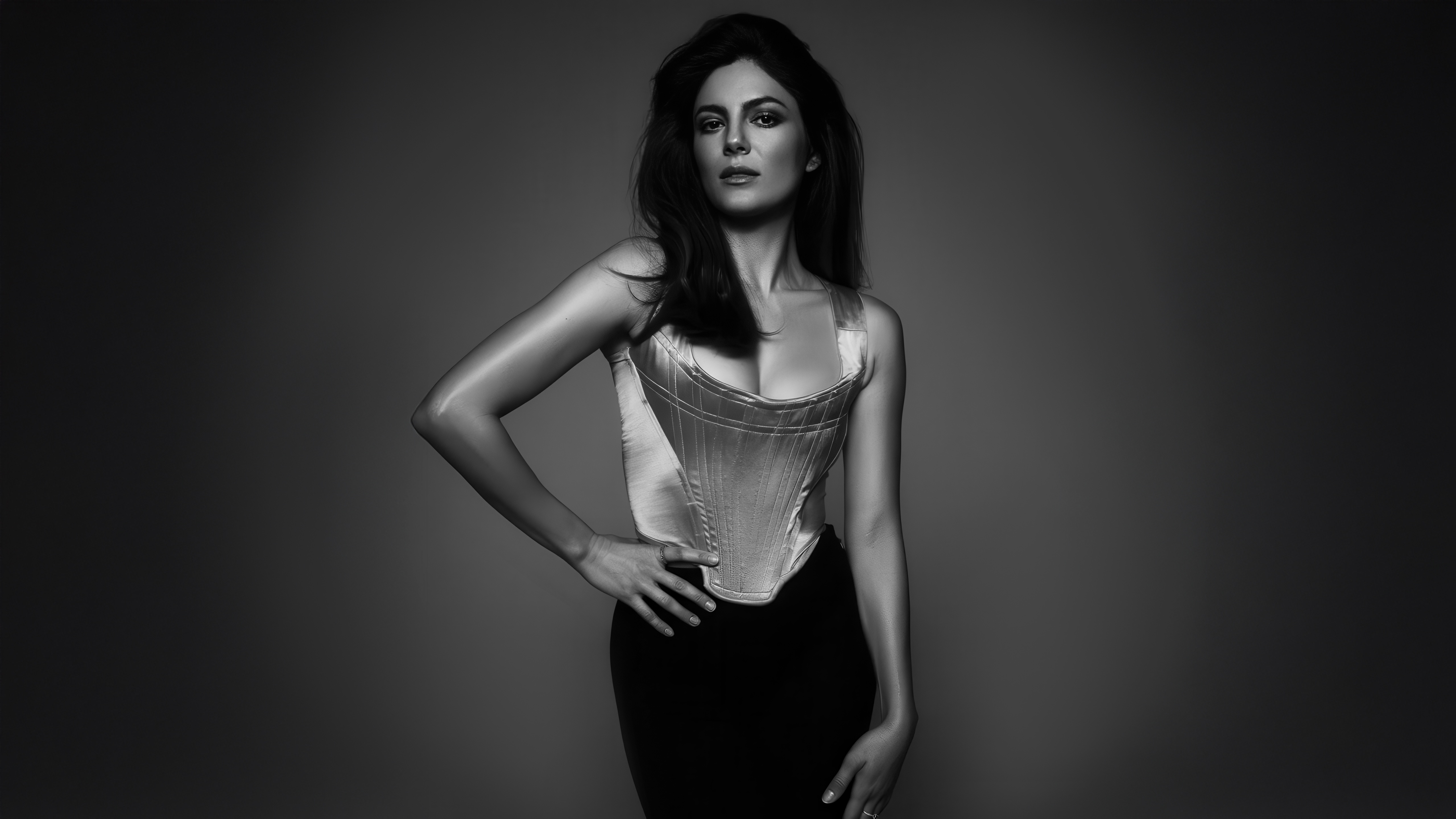Monica Barbaro in a corset and skirt HD Wallpaper