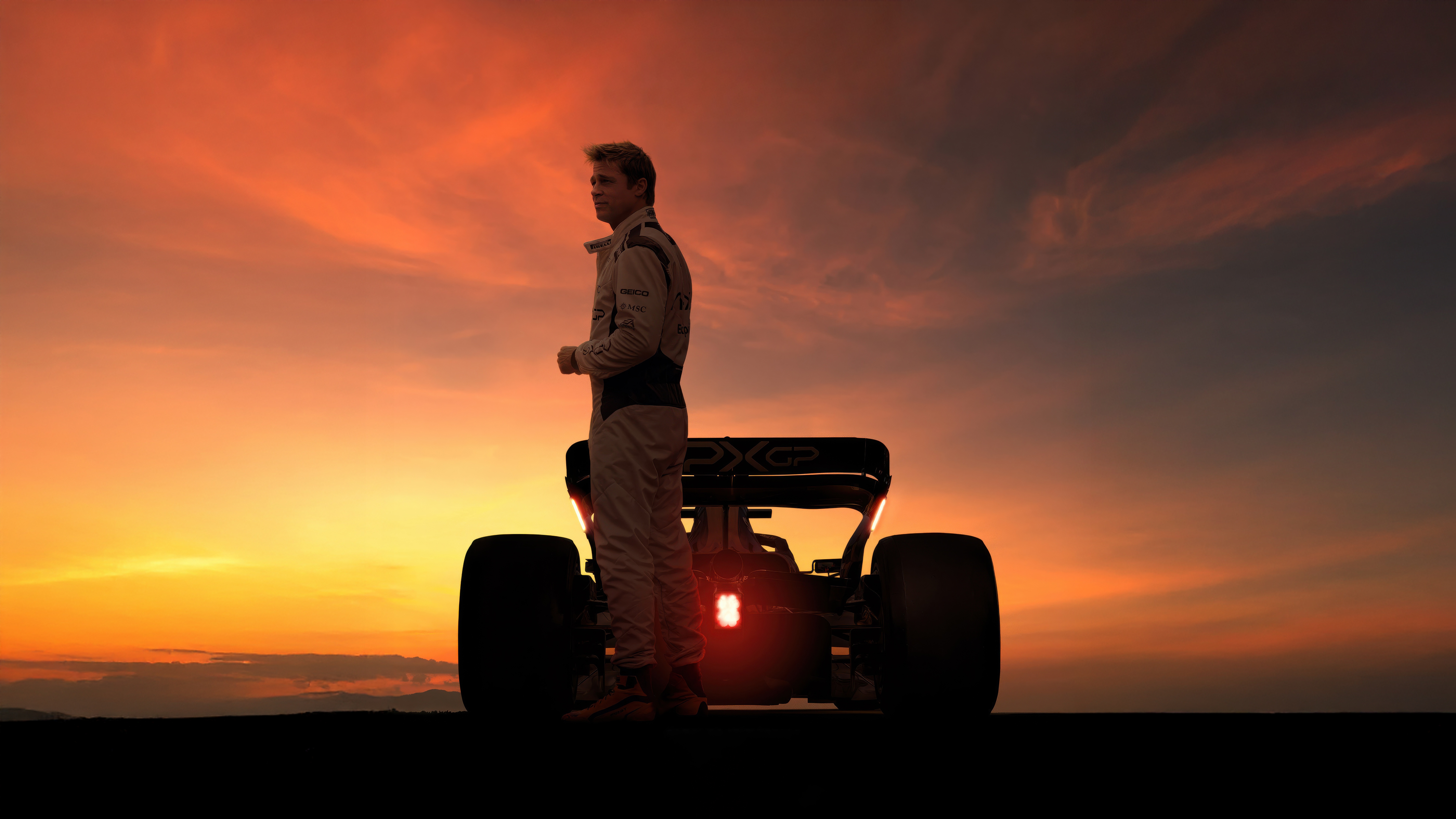 Formula 1 Movie: Racer and Car at Sunset HD Wallpaper